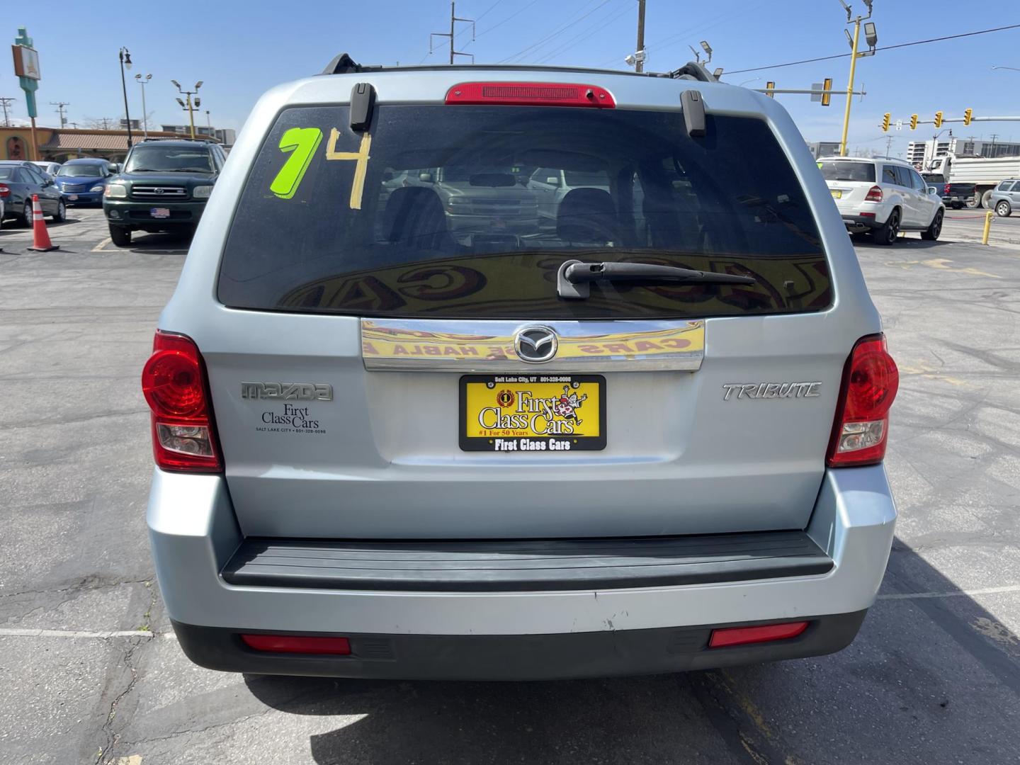 2008 Blue /Tan Mazda Tribute i Grand Touring FWD (4F2CZ02Z38K) with an 2.3L L4 DOHC 24V engine, 4-Speed Automatic Overdrive transmission, located at 801 South State Street, Salt Lake City, UT, 84111, (801) 328-0098, 40.751953, -111.888206 - Clean title! No reported accidents on Carfax history report only 3 previous owners!!! Features: Alloy Wheels, Cloth Seats, Sport Package, ABS Brakes, Auxiliary Audio Input, Power Locks, Side Airbags, AM/FM Stereo, CD Audio, Power Mirrors, Traction Control, Air Conditioning, Full Roof Rack, Power W - Photo#6
