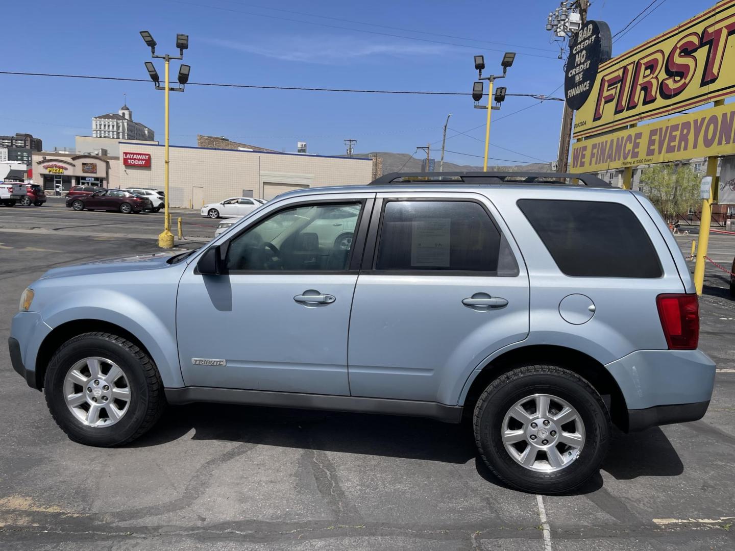 2008 Blue /Tan Mazda Tribute i Grand Touring FWD (4F2CZ02Z38K) with an 2.3L L4 DOHC 24V engine, 4-Speed Automatic Overdrive transmission, located at 801 South State Street, Salt Lake City, UT, 84111, (801) 328-0098, 40.751953, -111.888206 - Clean title! No reported accidents on Carfax history report only 3 previous owners!!! Features: Alloy Wheels, Cloth Seats, Sport Package, ABS Brakes, Auxiliary Audio Input, Power Locks, Side Airbags, AM/FM Stereo, CD Audio, Power Mirrors, Traction Control, Air Conditioning, Full Roof Rack, Power W - Photo#8