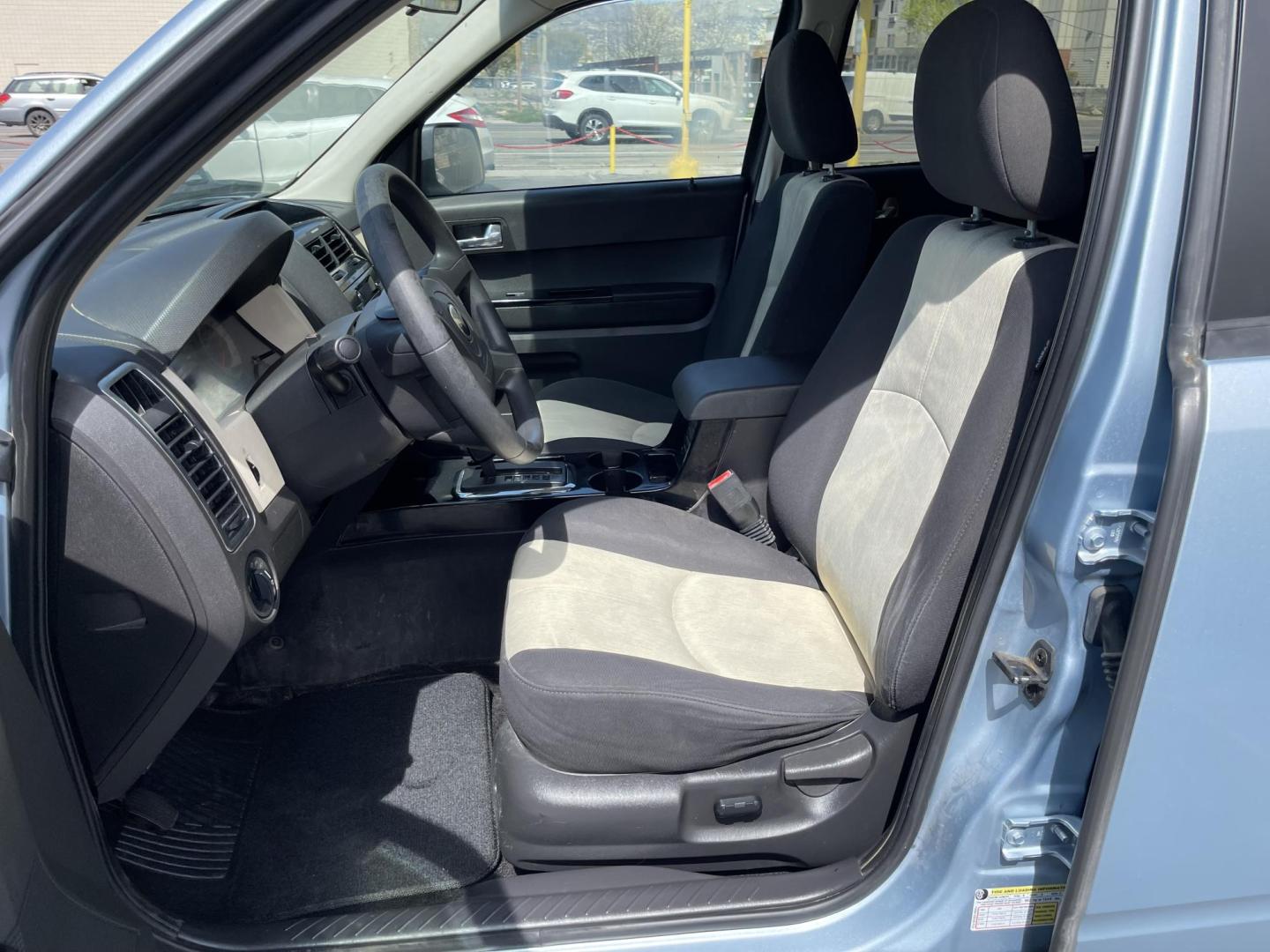 2008 Blue /Tan Mazda Tribute i Grand Touring FWD (4F2CZ02Z38K) with an 2.3L L4 DOHC 24V engine, 4-Speed Automatic Overdrive transmission, located at 801 South State Street, Salt Lake City, UT, 84111, (801) 328-0098, 40.751953, -111.888206 - Clean title! No reported accidents on Carfax history report only 3 previous owners!!! Features: Alloy Wheels, Cloth Seats, Sport Package, ABS Brakes, Auxiliary Audio Input, Power Locks, Side Airbags, AM/FM Stereo, CD Audio, Power Mirrors, Traction Control, Air Conditioning, Full Roof Rack, Power W - Photo#9