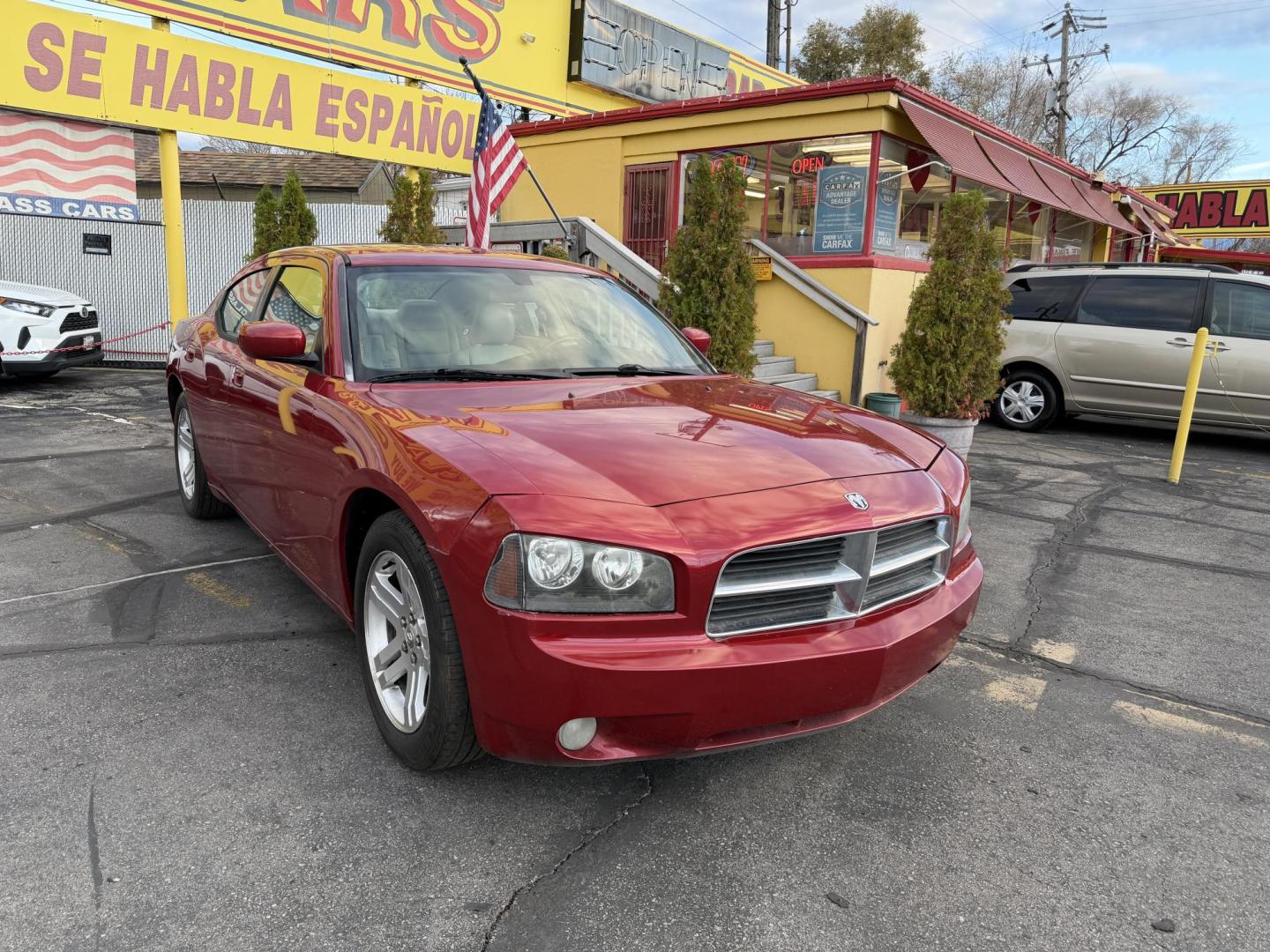 2006 Flame Red /TAN Dodge Charger R/T (2B3KA53H56H) with an 5.7L V8 OHV 16V engine, 5-Speed Automatic Overdrive transmission, located at 801 South State Street, Salt Lake City, UT, 84111, (801) 328-0098, 40.751953, -111.888206 - Clean title! No accidents on Carfax! Good running vehicle! Affordable transportation! Features: Automatic, Leather Seats, Heated Seats, Power Seats, Alloy Wheels, am/fm/cd radio, 5.7 Liter V8, power windows, power locks, moonroof, * All advertised prices are just dollars above cost to make room - Photo#2