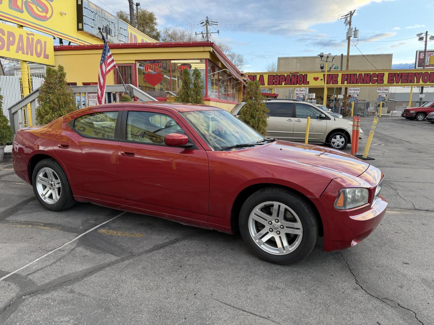 2006 Flame Red /TAN Dodge Charger R/T (2B3KA53H56H) with an 5.7L V8 OHV 16V engine, 5-Speed Automatic Overdrive transmission, located at 801 South State Street, Salt Lake City, UT, 84111, (801) 328-0098, 40.751953, -111.888206 - Clean title! No accidents on Carfax! Good running vehicle! Affordable transportation! Features: Automatic, Leather Seats, Heated Seats, Power Seats, Alloy Wheels, am/fm/cd radio, 5.7 Liter V8, power windows, power locks, moonroof, * All advertised prices are just dollars above cost to make room - Photo#3