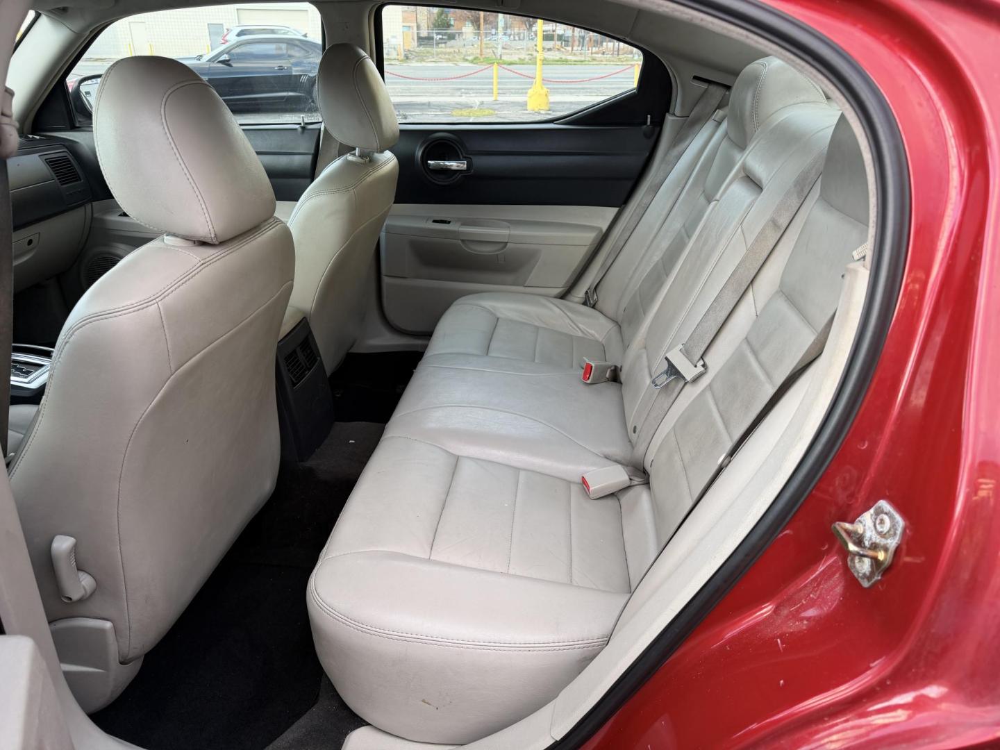 2006 Flame Red /TAN Dodge Charger R/T (2B3KA53H56H) with an 5.7L V8 OHV 16V engine, 5-Speed Automatic Overdrive transmission, located at 801 South State Street, Salt Lake City, UT, 84111, (801) 328-0098, 40.751953, -111.888206 - Clean title! No accidents on Carfax! Good running vehicle! Affordable transportation! Features: Automatic, Leather Seats, Heated Seats, Power Seats, Alloy Wheels, am/fm/cd radio, 5.7 Liter V8, power windows, power locks, moonroof, * All advertised prices are just dollars above cost to make room - Photo#10