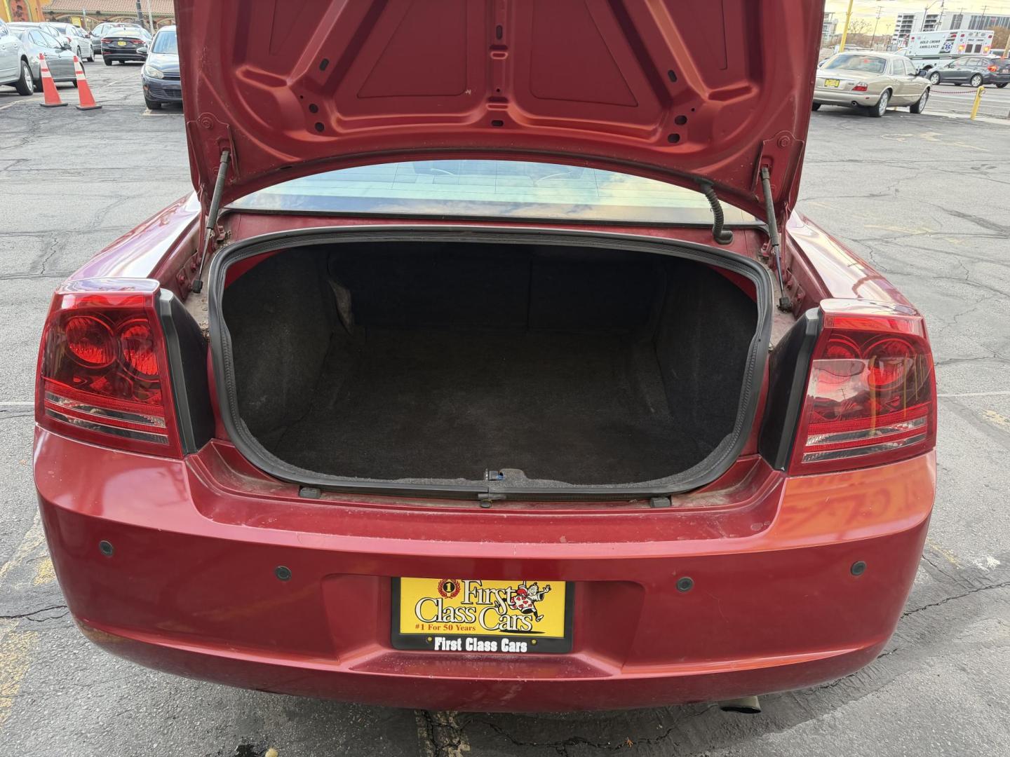 2006 Flame Red /TAN Dodge Charger R/T (2B3KA53H56H) with an 5.7L V8 OHV 16V engine, 5-Speed Automatic Overdrive transmission, located at 801 South State Street, Salt Lake City, UT, 84111, (801) 328-0098, 40.751953, -111.888206 - Clean title! No accidents on Carfax! Good running vehicle! Affordable transportation! Features: Automatic, Leather Seats, Heated Seats, Power Seats, Alloy Wheels, am/fm/cd radio, 5.7 Liter V8, power windows, power locks, moonroof, * All advertised prices are just dollars above cost to make room - Photo#21