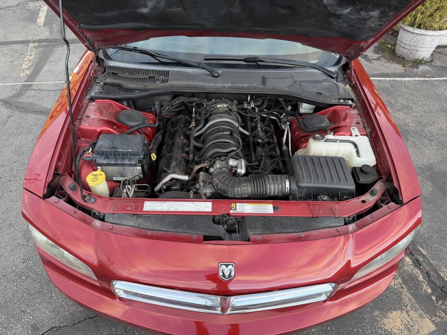 2006 Flame Red /TAN Dodge Charger R/T (2B3KA53H56H) with an 5.7L V8 OHV 16V engine, 5-Speed Automatic Overdrive transmission, located at 801 South State Street, Salt Lake City, UT, 84111, (801) 328-0098, 40.751953, -111.888206 - Clean title! No accidents on Carfax! Good running vehicle! Affordable transportation! Features: Automatic, Leather Seats, Heated Seats, Power Seats, Alloy Wheels, am/fm/cd radio, 5.7 Liter V8, power windows, power locks, moonroof, * All advertised prices are just dollars above cost to make room - Photo#19