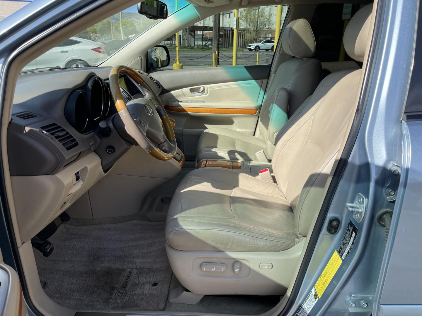2008 True Blue Metallic /Tan Lexus RX 350 AWD (2T2HK31U38C) with an 3.5L V6 engine, 5-Speed Automatic Overdrive transmission, located at 801 South State Street, Salt Lake City, UT, 84111, (801) 328-0098, 40.751953, -111.888206 - Extra clean car! Hard find with low miles. Clean all year vehicle great for winter as well with all wheel drive! Has good tires Continental all season tires. Features: 4WD/AWD, Navigation, Blue-tooth stereo syetem, Aux audi input, Apple Car play/Android car play, Heated seats, Alloy Wheels, Leathe - Photo#14