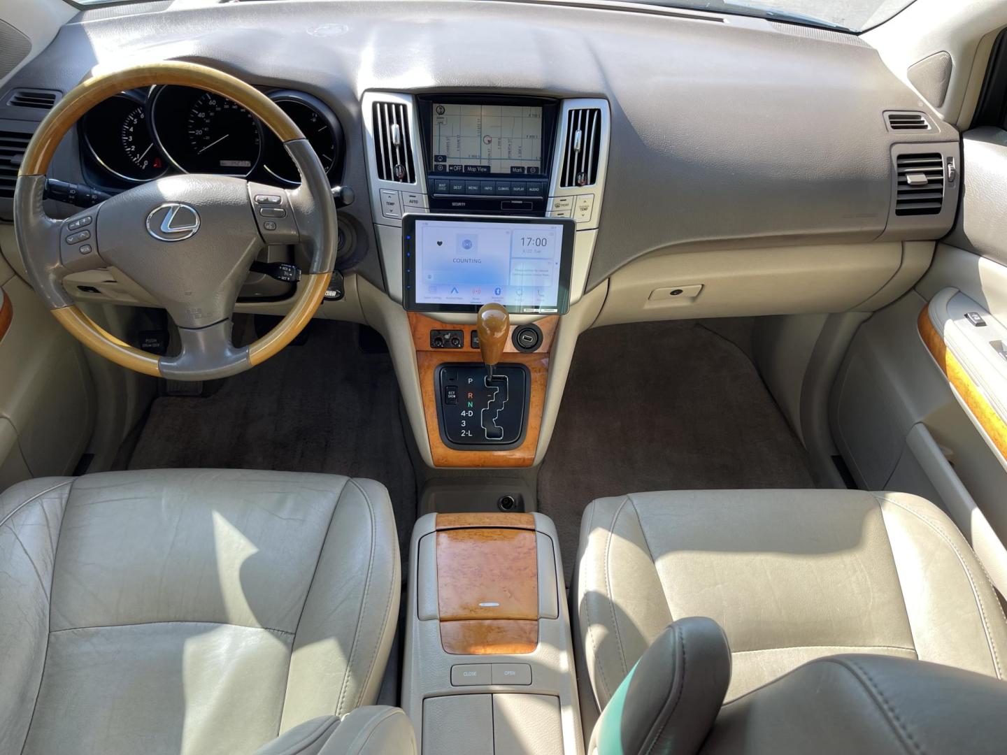 2008 True Blue Metallic /Tan Lexus RX 350 AWD (2T2HK31U38C) with an 3.5L V6 engine, 5-Speed Automatic Overdrive transmission, located at 801 South State Street, Salt Lake City, UT, 84111, (801) 328-0098, 40.751953, -111.888206 - Extra clean car! Hard find with low miles. Clean all year vehicle great for winter as well with all wheel drive! Has good tires Continental all season tires. Features: 4WD/AWD, Navigation, Blue-tooth stereo syetem, Aux audi input, Apple Car play/Android car play, Heated seats, Alloy Wheels, Leathe - Photo#16