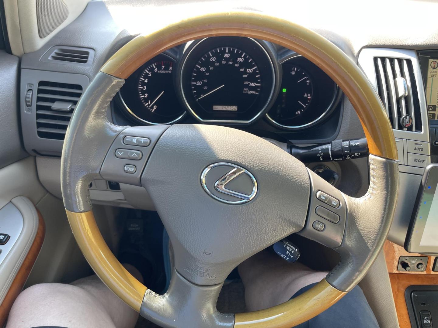 2008 True Blue Metallic /Tan Lexus RX 350 AWD (2T2HK31U38C) with an 3.5L V6 engine, 5-Speed Automatic Overdrive transmission, located at 801 South State Street, Salt Lake City, UT, 84111, (801) 328-0098, 40.751953, -111.888206 - Extra clean car! Hard find with low miles. Clean all year vehicle great for winter as well with all wheel drive! Has good tires Continental all season tires. Features: 4WD/AWD, Navigation, Blue-tooth stereo syetem, Aux audi input, Apple Car play/Android car play, Heated seats, Alloy Wheels, Leathe - Photo#25