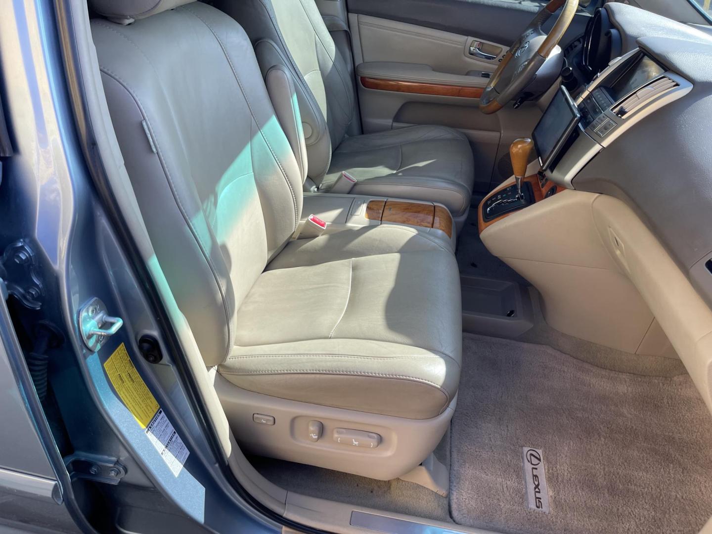 2008 True Blue Metallic /Tan Lexus RX 350 AWD (2T2HK31U38C) with an 3.5L V6 engine, 5-Speed Automatic Overdrive transmission, located at 801 South State Street, Salt Lake City, UT, 84111, (801) 328-0098, 40.751953, -111.888206 - Extra clean car! Hard find with low miles. Clean all year vehicle great for winter as well with all wheel drive! Has good tires Continental all season tires. Features: 4WD/AWD, Navigation, Blue-tooth stereo syetem, Aux audi input, Apple Car play/Android car play, Heated seats, Alloy Wheels, Leathe - Photo#30