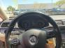 2015 Super White /Tan Volkswagen Passat TDI SE 6A w/ Sunroof (1VWBV7A31FC) with an 2.0L L4 DOHC 16V TURBO DIESEL engine, 6-Speed Automatic transmission, located at 801 South State Street, Salt Lake City, UT, 84111, (801) 328-0098, 40.751953, -111.888206 - Clean title! Hard to find Turbo Diesel engine great gas mileage! The EPA-estimated fuel economy is an excellent 34 mpg combined (30 city/42 highway). Clean car inside and out this vehicle is in immaculate condition this is a must see for any looking for a clean diesel Passat!!! Every car at First Cl - Photo#4