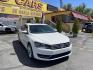 2015 Super White /Tan Volkswagen Passat TDI SE 6A w/ Sunroof (1VWBV7A31FC) with an 2.0L L4 DOHC 16V TURBO DIESEL engine, 6-Speed Automatic transmission, located at 801 South State Street, Salt Lake City, UT, 84111, (801) 328-0098, 40.751953, -111.888206 - Clean title! Hard to find Turbo Diesel engine great gas mileage! The EPA-estimated fuel economy is an excellent 34 mpg combined (30 city/42 highway). Clean car inside and out this vehicle is in immaculate condition this is a must see for any looking for a clean diesel Passat!!! Every car at First Cl - Photo#3