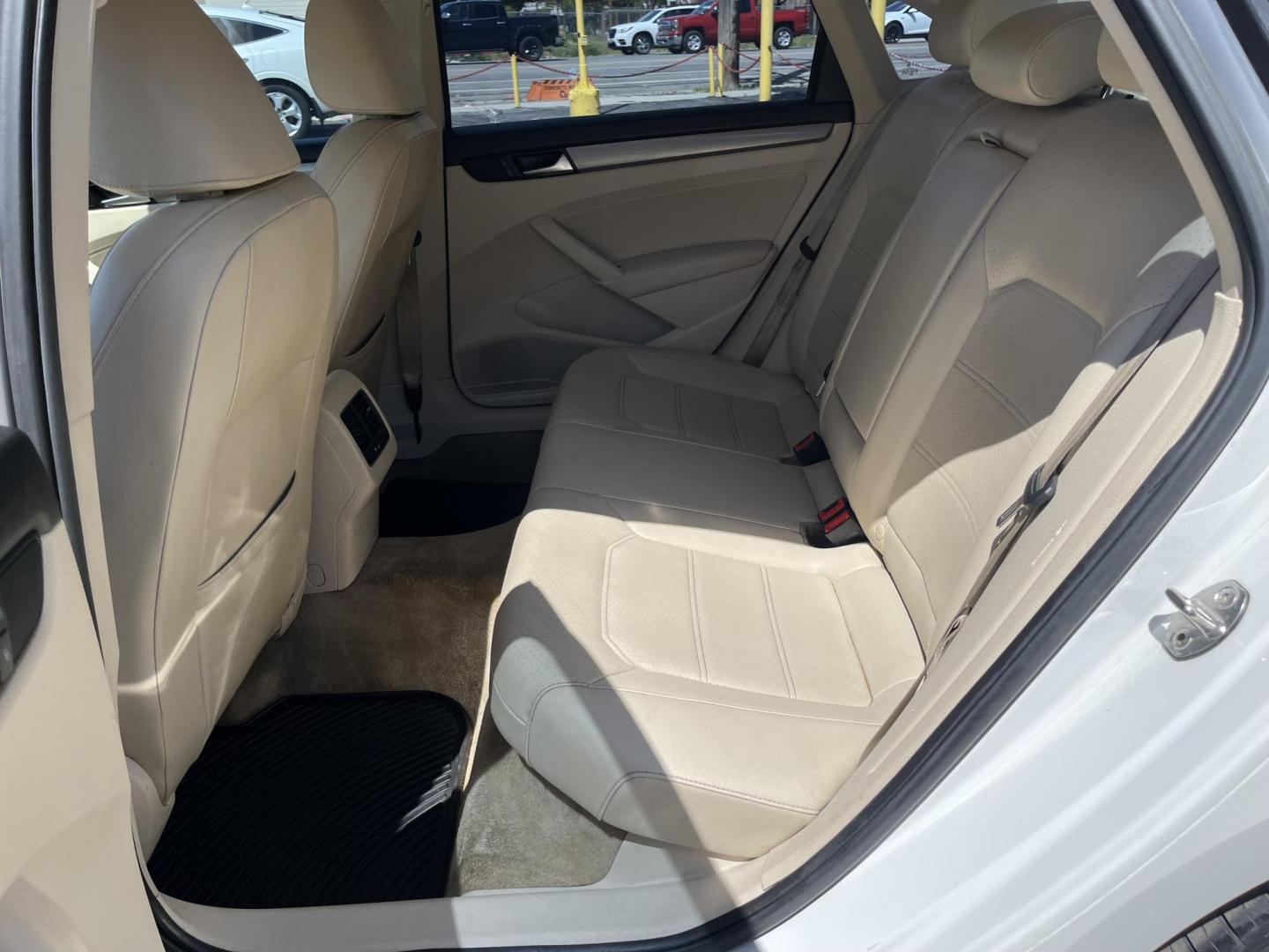 2015 Super White /Tan Volkswagen Passat TDI SE 6A w/ Sunroof (1VWBV7A31FC) with an 2.0L L4 DOHC 16V TURBO DIESEL engine, 6-Speed Automatic transmission, located at 801 South State Street, Salt Lake City, UT, 84111, (801) 328-0098, 40.751953, -111.888206 - Clean title! Hard to find Turbo Diesel engine great gas mileage! The EPA-estimated fuel economy is an excellent 34 mpg combined (30 city/42 highway). Clean car inside and out this vehicle is in immaculate condition this is a must see for any looking for a clean diesel Passat!!! Every car at First Cl - Photo#14