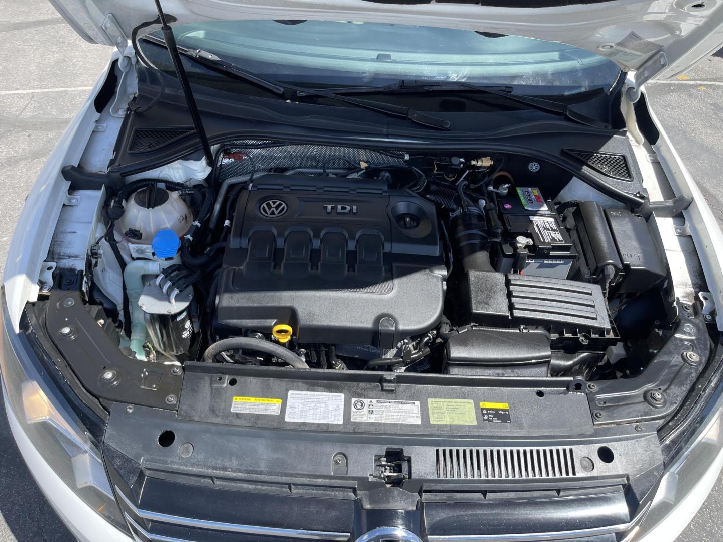 2015 Super White /Tan Volkswagen Passat TDI SE 6A w/ Sunroof (1VWBV7A31FC) with an 2.0L L4 DOHC 16V TURBO DIESEL engine, 6-Speed Automatic transmission, located at 801 South State Street, Salt Lake City, UT, 84111, (801) 328-0098, 40.751953, -111.888206 - Clean title! Hard to find Turbo Diesel engine great gas mileage! The EPA-estimated fuel economy is an excellent 34 mpg combined (30 city/42 highway). Clean car inside and out this vehicle is in immaculate condition this is a must see for any looking for a clean diesel Passat!!! Every car at First Cl - Photo#23