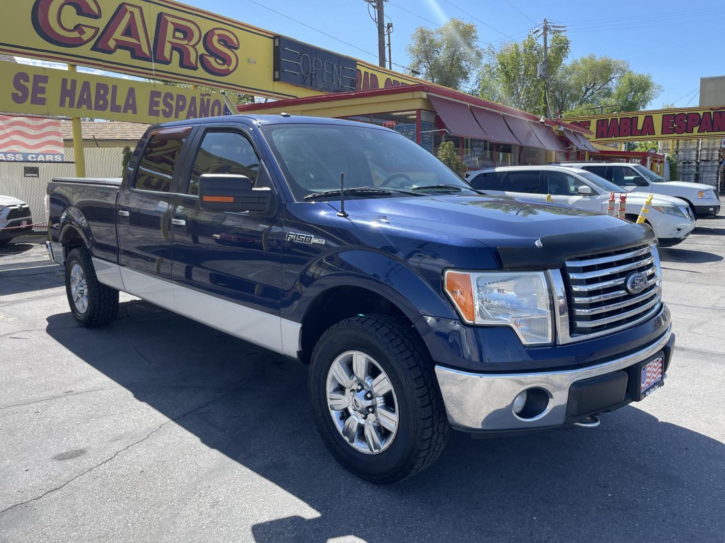 2011 Blue /Gray Ford F-150 FX4 SuperCrew 5.5-ft. Bed 4WD (1FTFW1EF0BF) with an 5.0L V8 engine, 4-Speed Automatic transmission, located at 801 South State Street, Salt Lake City, UT, 84111, (801) 328-0098, 40.751953, -111.888206 - Clean title! Hard find extra clean! Immaculate condition! 6 passenger truck lots of room inside! 4x4 tires are in great shape! Must see truck for anyone looking for a clean 4x4 truck!!! Features: 4x4, Cloth Seats, Alloy Wheels, Rear View Camera, Bed Cover, Satellite Radio Ready, Bed Liner,Tow Hitch - Photo#4