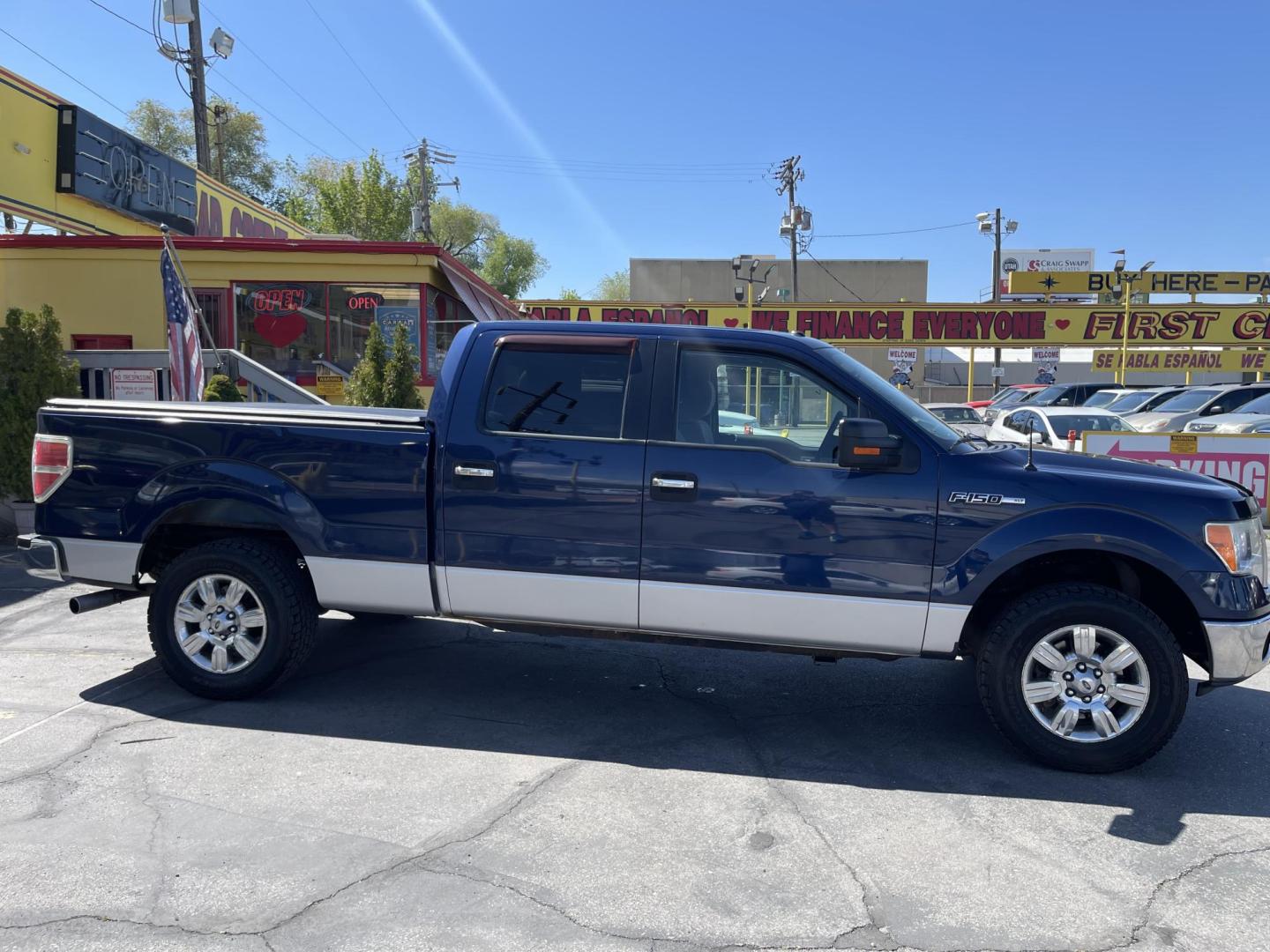 2011 Blue /Gray Ford F-150 FX4 SuperCrew 5.5-ft. Bed 4WD (1FTFW1EF0BF) with an 5.0L V8 engine, 4-Speed Automatic transmission, located at 801 South State Street, Salt Lake City, UT, 84111, (801) 328-0098, 40.751953, -111.888206 - Clean title! Hard find extra clean! Immaculate condition! 6 passenger truck lots of room inside! 4x4 tires are in great shape! Must see truck for anyone looking for a clean 4x4 truck!!! Features: 4x4, Cloth Seats, Alloy Wheels, Rear View Camera, Bed Cover, Satellite Radio Ready, Bed Liner,Tow Hitch - Photo#5