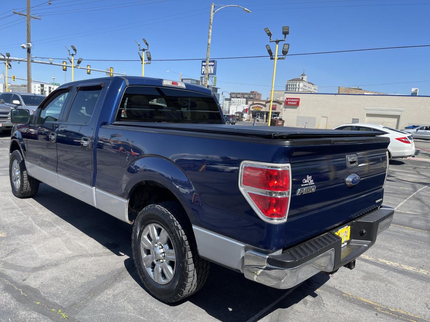 2011 Blue /Gray Ford F-150 FX4 SuperCrew 5.5-ft. Bed 4WD (1FTFW1EF0BF) with an 5.0L V8 engine, 4-Speed Automatic transmission, located at 801 South State Street, Salt Lake City, UT, 84111, (801) 328-0098, 40.751953, -111.888206 - Clean title! Hard find extra clean! Immaculate condition! 6 passenger truck lots of room inside! 4x4 tires are in great shape! Must see truck for anyone looking for a clean 4x4 truck!!! Features: 4x4, Cloth Seats, Alloy Wheels, Rear View Camera, Bed Cover, Satellite Radio Ready, Bed Liner,Tow Hitch - Photo#8