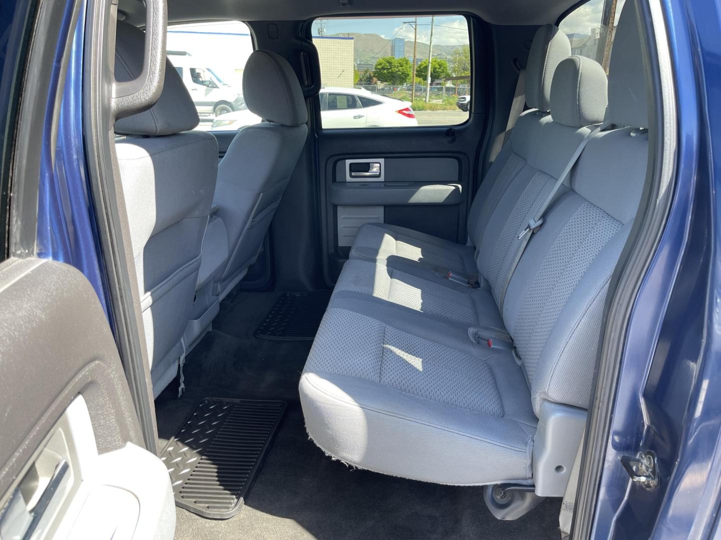 2011 Blue /Gray Ford F-150 FX4 SuperCrew 5.5-ft. Bed 4WD (1FTFW1EF0BF) with an 5.0L V8 engine, 4-Speed Automatic transmission, located at 801 South State Street, Salt Lake City, UT, 84111, (801) 328-0098, 40.751953, -111.888206 - Clean title! Hard find extra clean! Immaculate condition! 6 passenger truck lots of room inside! 4x4 tires are in great shape! Must see truck for anyone looking for a clean 4x4 truck!!! Features: 4x4, Cloth Seats, Alloy Wheels, Rear View Camera, Bed Cover, Satellite Radio Ready, Bed Liner,Tow Hitch - Photo#16