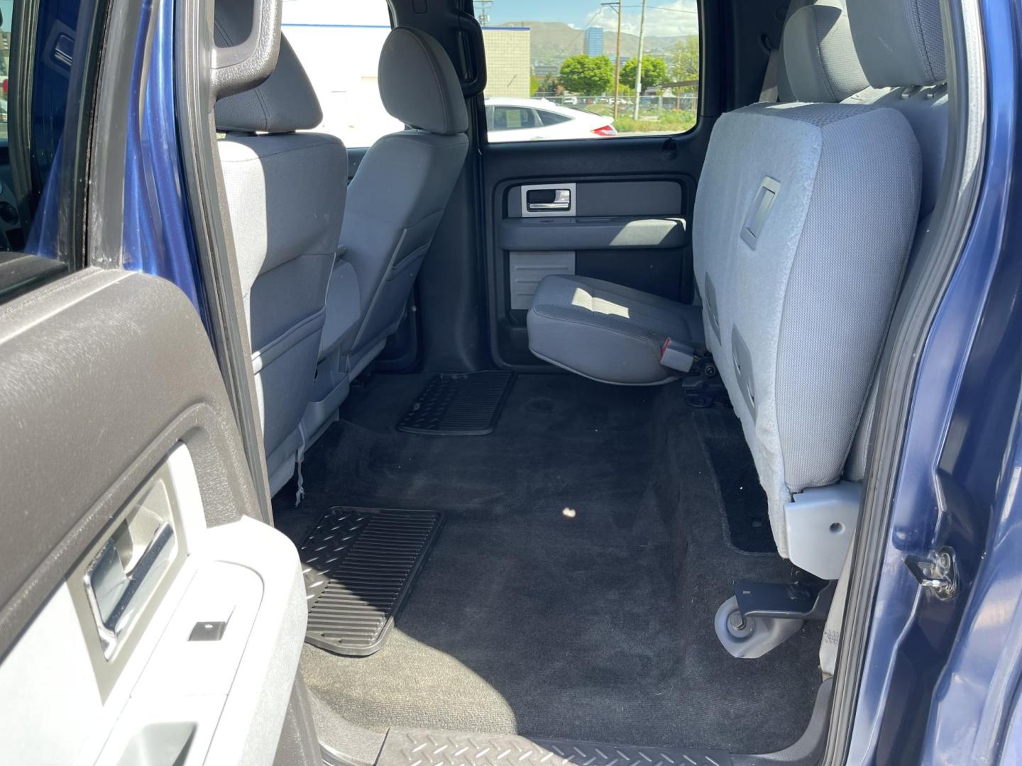 2011 Blue /Gray Ford F-150 FX4 SuperCrew 5.5-ft. Bed 4WD (1FTFW1EF0BF) with an 5.0L V8 engine, 4-Speed Automatic transmission, located at 801 South State Street, Salt Lake City, UT, 84111, (801) 328-0098, 40.751953, -111.888206 - Clean title! Hard find extra clean! Immaculate condition! 6 passenger truck lots of room inside! 4x4 tires are in great shape! Must see truck for anyone looking for a clean 4x4 truck!!! Features: 4x4, Cloth Seats, Alloy Wheels, Rear View Camera, Bed Cover, Satellite Radio Ready, Bed Liner,Tow Hitch - Photo#17