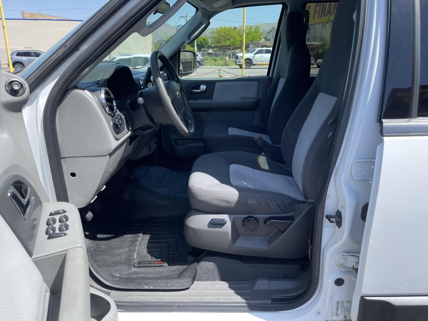 2006 Super White /Gray Ford Expedition XLT 4WD (1FMPU16576L) with an 5.4L V8 SOHC 16V engine, 4-Speed Automatic transmission, located at 801 South State Street, Salt Lake City, UT, 84111, (801) 328-0098, 40.751953, -111.888206 - Clean title on Carfax! Good affordable 4x4 SUV great all year around vehicle! Good family vehicle with 3rd row seating 8 passenger SUV! Features: 4WD/AWD, Quad Seats, Alloy Wheels, Running Boards, Cloth Seats, Third Row Seat, Fold-Away Third Row, Tow Hitch, ABS Brakes, Automatic Transmission, Crui - Photo#13