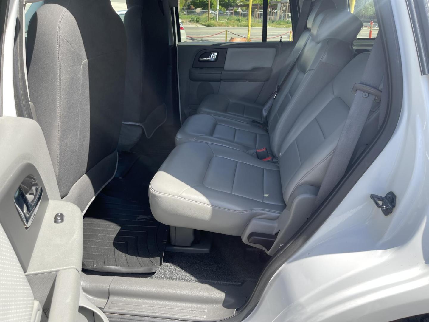 2006 Super White /Gray Ford Expedition XLT 4WD (1FMPU16576L) with an 5.4L V8 SOHC 16V engine, 4-Speed Automatic transmission, located at 801 South State Street, Salt Lake City, UT, 84111, (801) 328-0098, 40.751953, -111.888206 - Clean title on Carfax! Good affordable 4x4 SUV great all year around vehicle! Good family vehicle with 3rd row seating 8 passenger SUV! Features: 4WD/AWD, Quad Seats, Alloy Wheels, Running Boards, Cloth Seats, Third Row Seat, Fold-Away Third Row, Tow Hitch, ABS Brakes, Automatic Transmission, Crui - Photo#14