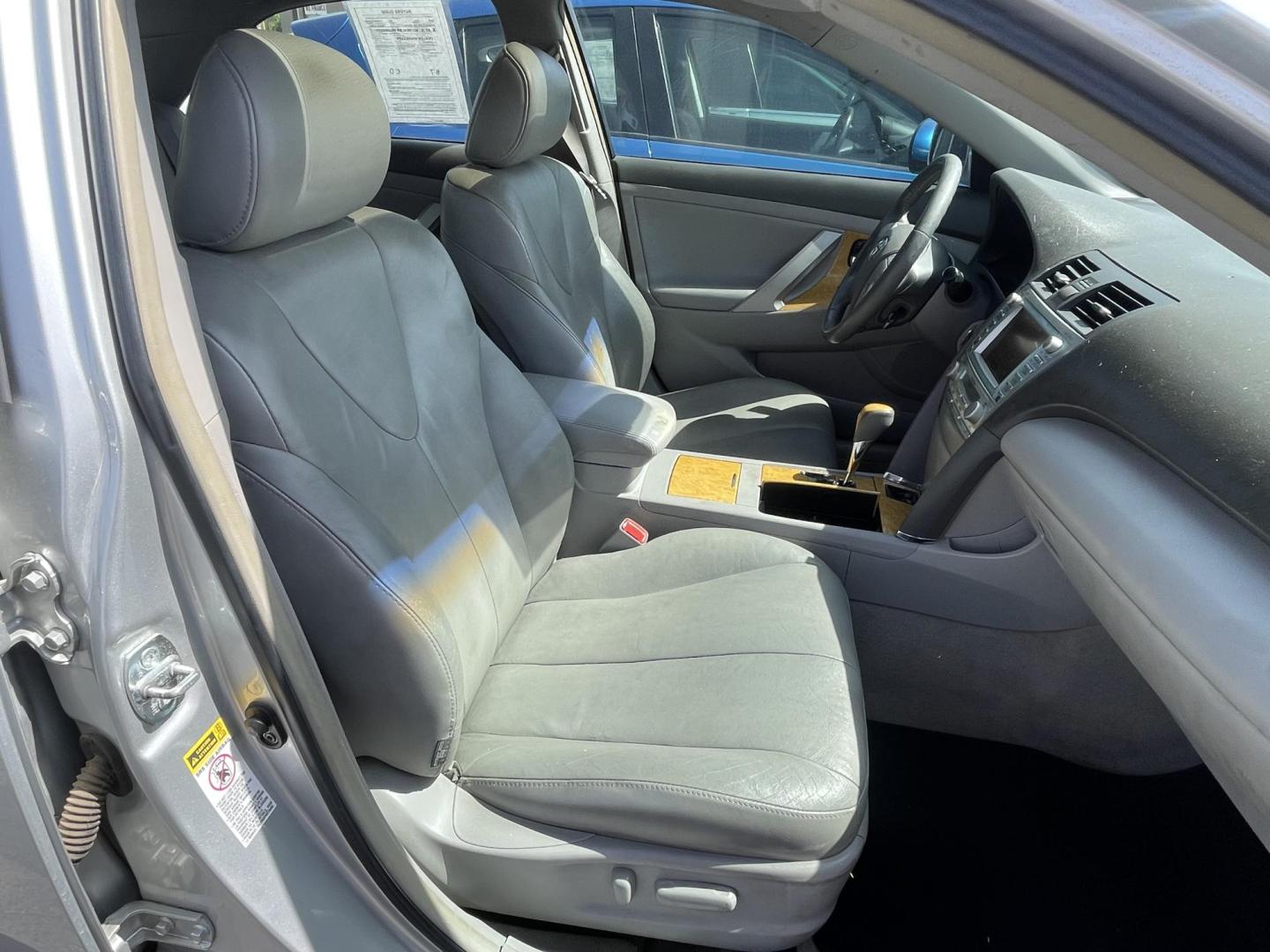 2007 Silver Sky Metallic /Tan Toyota Camry LE V6 (4T1BK46K47U) with an 3.5L V6 DOHC 24V engine, 6-Speed Automatic Overdrive transmission, located at 801 South State Street, Salt Lake City, UT, 84111, (801) 328-0098, 40.751953, -111.888206 - Clean title! Super low Miles for the year! No accidents on Carfax! 22 service records on Carfax that show regular maintenance and service including oil changes! From a dry climate area in Arizona has not been in the Utah snow yet! Approved for up to a 5 year warranty through our national warranty co - Photo#20