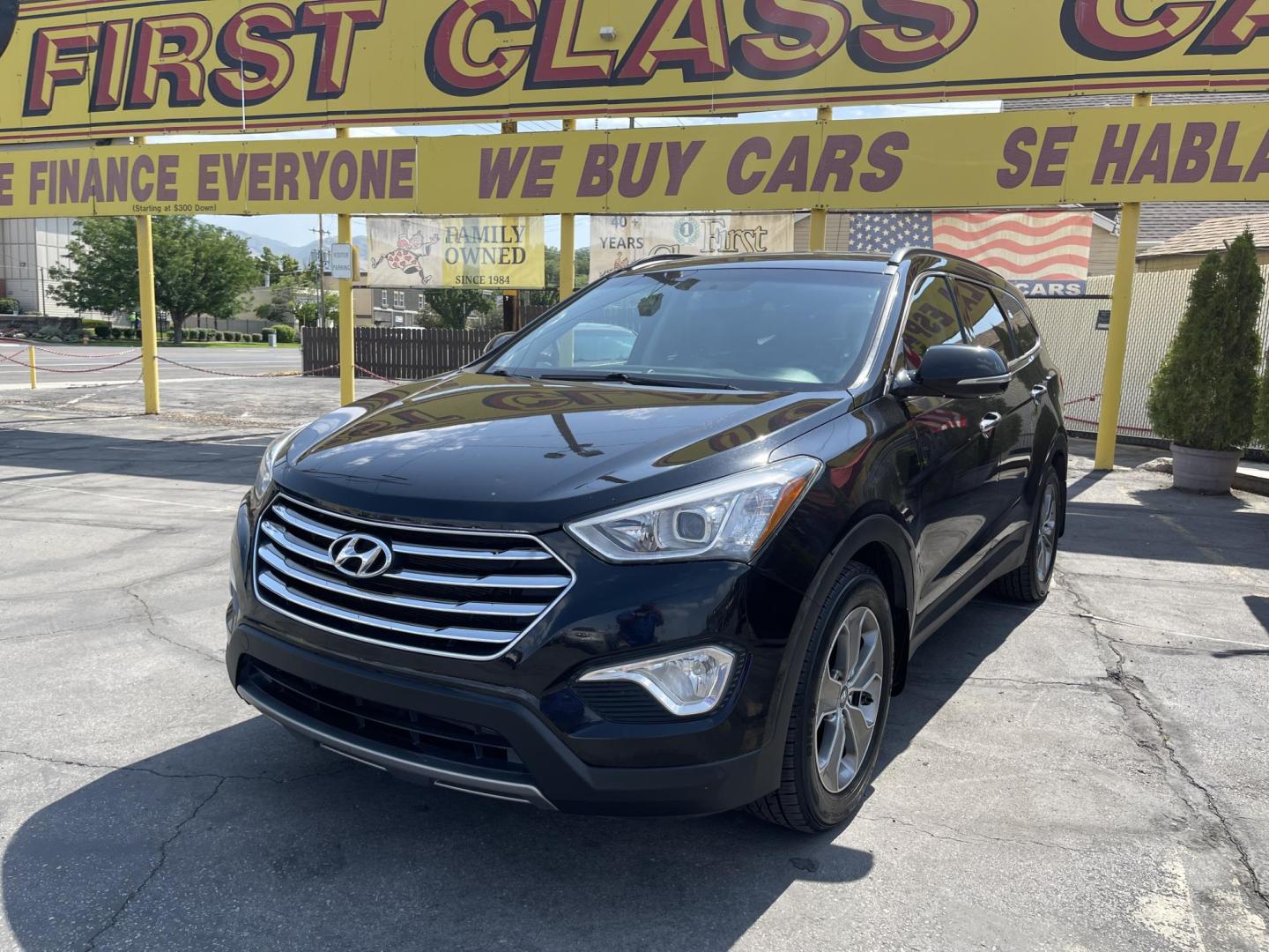 2013 Black /Tan Hyundai Santa Fe GLS AWD (KM8SNDHF2DU) with an 3.3L V6 DOHC 24V engine, 6-Speed Automatic transmission, located at 801 South State Street, Salt Lake City, UT, 84111, (801) 328-0098, 40.751953, -111.888206 - Super clean 2013 Santa Fe inside and out very clean SUV! Clean title! 3rd row seating! Leather Seats! All Wheel Drive! Approved for up to a 5 year bumper to bumper warranty that covers every major part! This is a must see for anyone looking for a clean SUV with 3rd row seating! Features: 4WD/AWD, A - Photo#1