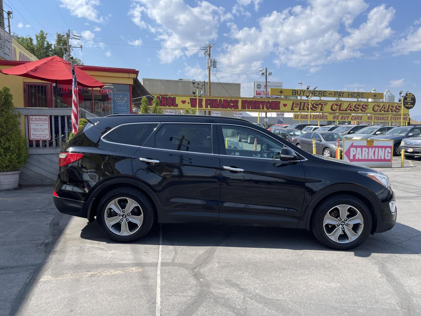 2013 Black /Tan Hyundai Santa Fe GLS AWD (KM8SNDHF2DU) with an 3.3L V6 DOHC 24V engine, 6-Speed Automatic transmission, located at 801 South State Street, Salt Lake City, UT, 84111, (801) 328-0098, 40.751953, -111.888206 - Super clean 2013 Santa Fe inside and out very clean SUV! Clean title! 3rd row seating! Leather Seats! All Wheel Drive! Approved for up to a 5 year bumper to bumper warranty that covers every major part! This is a must see for anyone looking for a clean SUV with 3rd row seating! Features: 4WD/AWD, A - Photo#4