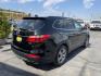 2013 Black /Tan Hyundai Santa Fe GLS AWD (KM8SNDHF2DU) with an 3.3L V6 DOHC 24V engine, 6-Speed Automatic transmission, located at 801 South State Street, Salt Lake City, UT, 84111, (801) 328-0098, 40.751953, -111.888206 - Super clean 2013 Santa Fe inside and out very clean SUV! Clean title! 3rd row seating! Leather Seats! All Wheel Drive! Approved for up to a 5 year bumper to bumper warranty that covers every major part! This is a must see for anyone looking for a clean SUV with 3rd row seating! Features: 4WD/AWD, A - Photo#5