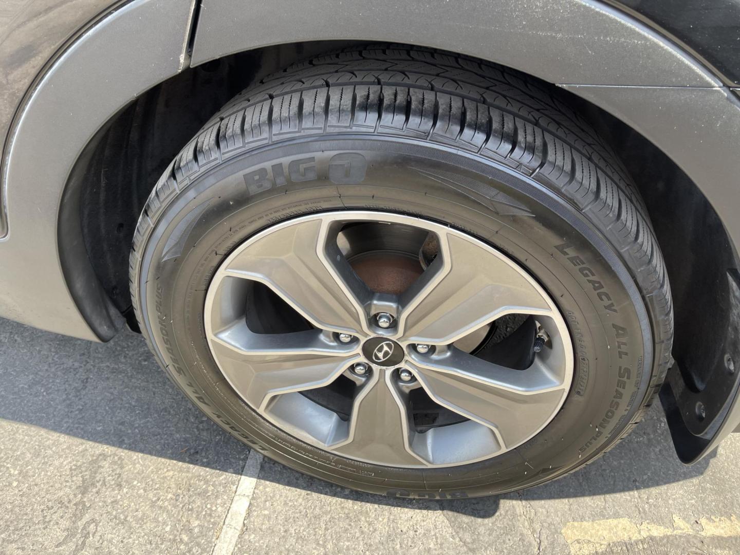 2013 Black /Tan Hyundai Santa Fe GLS AWD (KM8SNDHF2DU) with an 3.3L V6 DOHC 24V engine, 6-Speed Automatic transmission, located at 801 South State Street, Salt Lake City, UT, 84111, (801) 328-0098, 40.751953, -111.888206 - Super clean 2013 Santa Fe inside and out very clean SUV! Clean title! 3rd row seating! Leather Seats! All Wheel Drive! Approved for up to a 5 year bumper to bumper warranty that covers every major part! This is a must see for anyone looking for a clean SUV with 3rd row seating! Features: 4WD/AWD, A - Photo#11