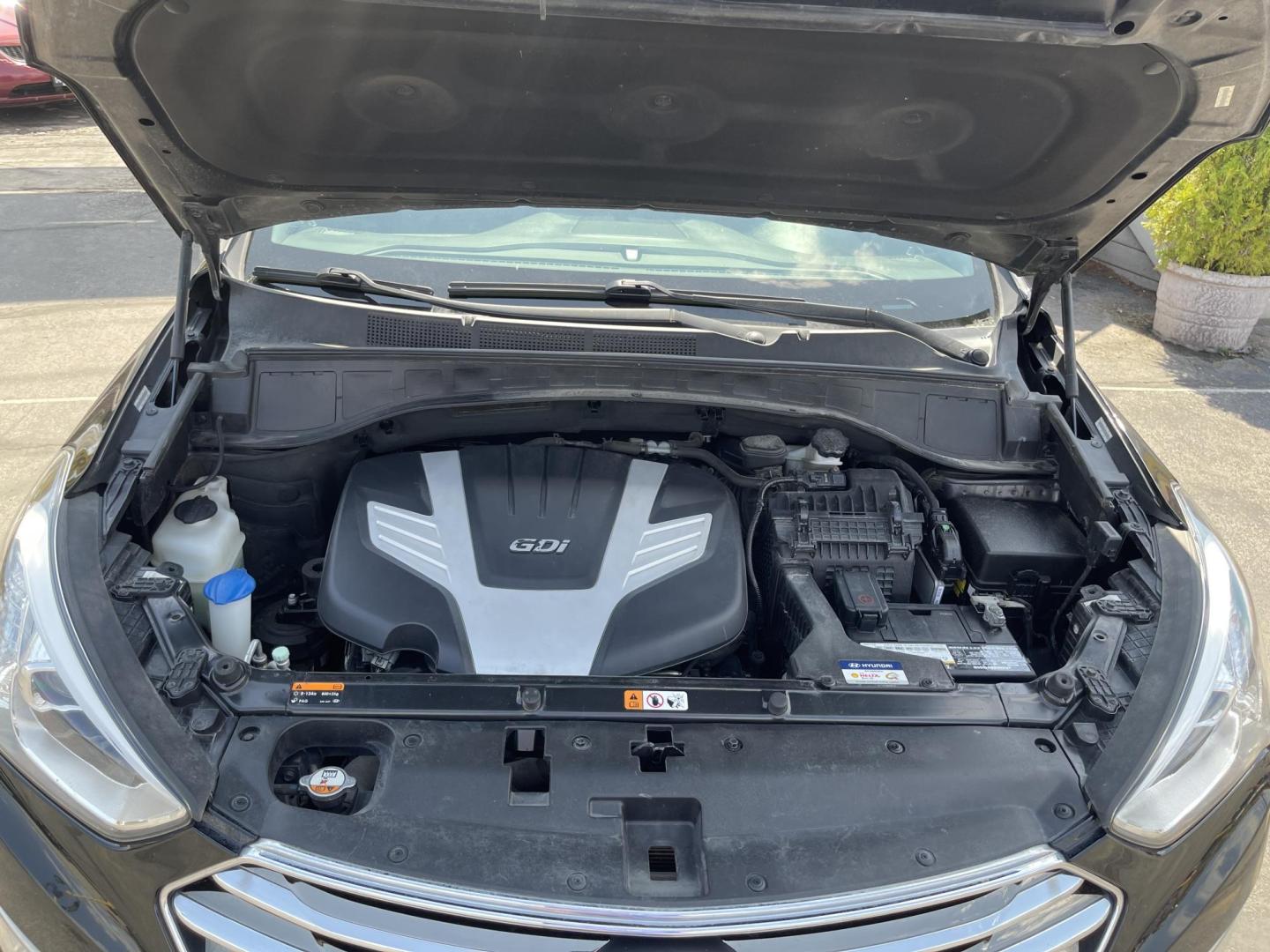 2013 Black /Tan Hyundai Santa Fe GLS AWD (KM8SNDHF2DU) with an 3.3L V6 DOHC 24V engine, 6-Speed Automatic transmission, located at 801 South State Street, Salt Lake City, UT, 84111, (801) 328-0098, 40.751953, -111.888206 - Super clean 2013 Santa Fe inside and out very clean SUV! Clean title! 3rd row seating! Leather Seats! All Wheel Drive! Approved for up to a 5 year bumper to bumper warranty that covers every major part! This is a must see for anyone looking for a clean SUV with 3rd row seating! Features: 4WD/AWD, A - Photo#22