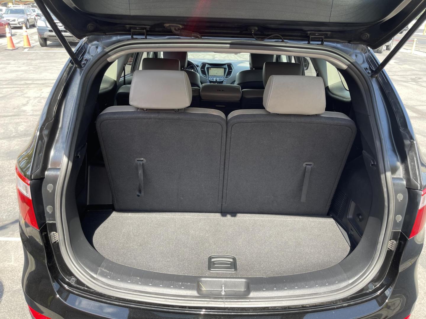 2013 Black /Tan Hyundai Santa Fe GLS AWD (KM8SNDHF2DU) with an 3.3L V6 DOHC 24V engine, 6-Speed Automatic transmission, located at 801 South State Street, Salt Lake City, UT, 84111, (801) 328-0098, 40.751953, -111.888206 - Super clean 2013 Santa Fe inside and out very clean SUV! Clean title! 3rd row seating! Leather Seats! All Wheel Drive! Approved for up to a 5 year bumper to bumper warranty that covers every major part! This is a must see for anyone looking for a clean SUV with 3rd row seating! Features: 4WD/AWD, A - Photo#24