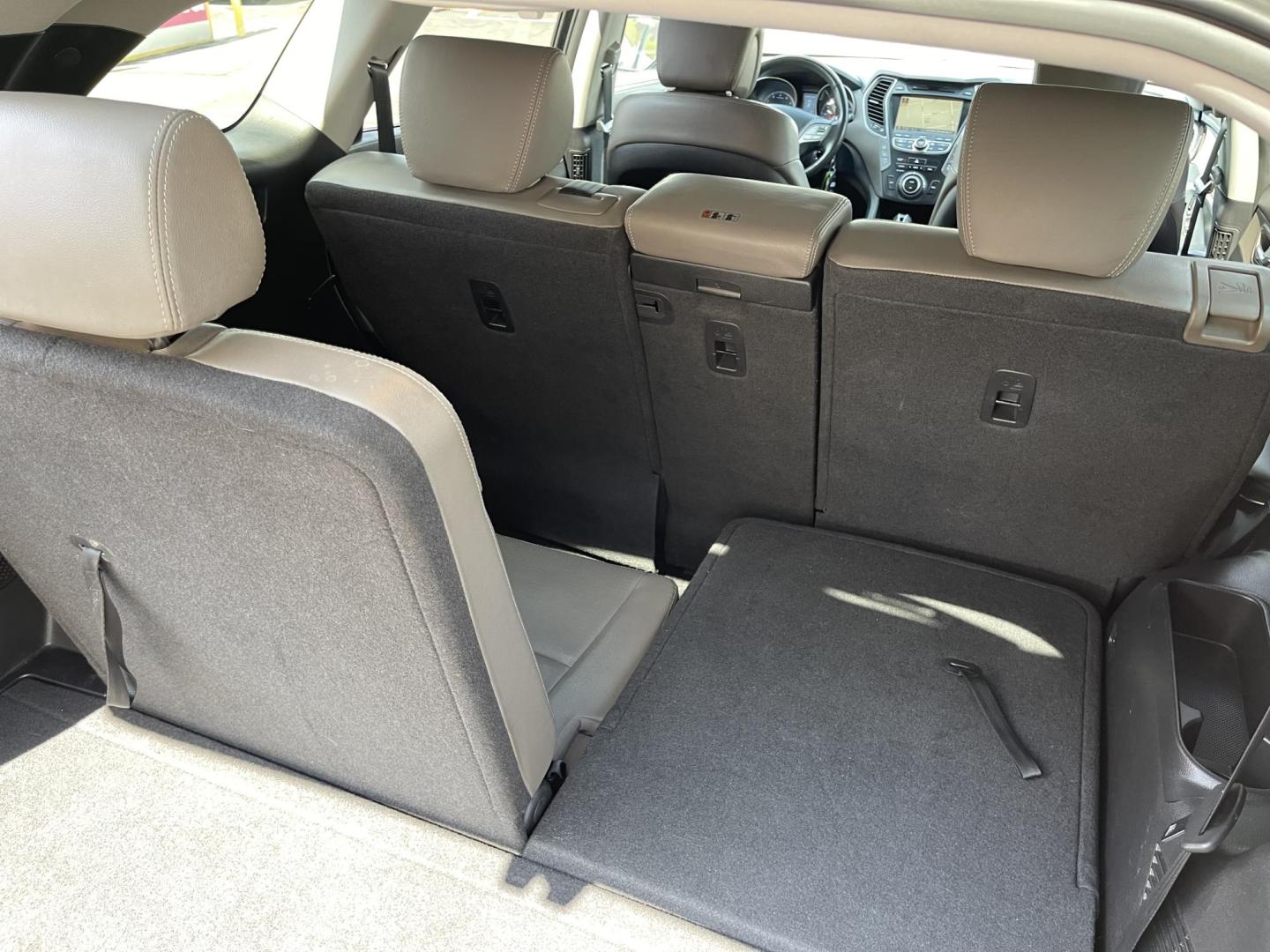 2013 Black /Tan Hyundai Santa Fe GLS AWD (KM8SNDHF2DU) with an 3.3L V6 DOHC 24V engine, 6-Speed Automatic transmission, located at 801 South State Street, Salt Lake City, UT, 84111, (801) 328-0098, 40.751953, -111.888206 - Super clean 2013 Santa Fe inside and out very clean SUV! Clean title! 3rd row seating! Leather Seats! All Wheel Drive! Approved for up to a 5 year bumper to bumper warranty that covers every major part! This is a must see for anyone looking for a clean SUV with 3rd row seating! Features: 4WD/AWD, A - Photo#25