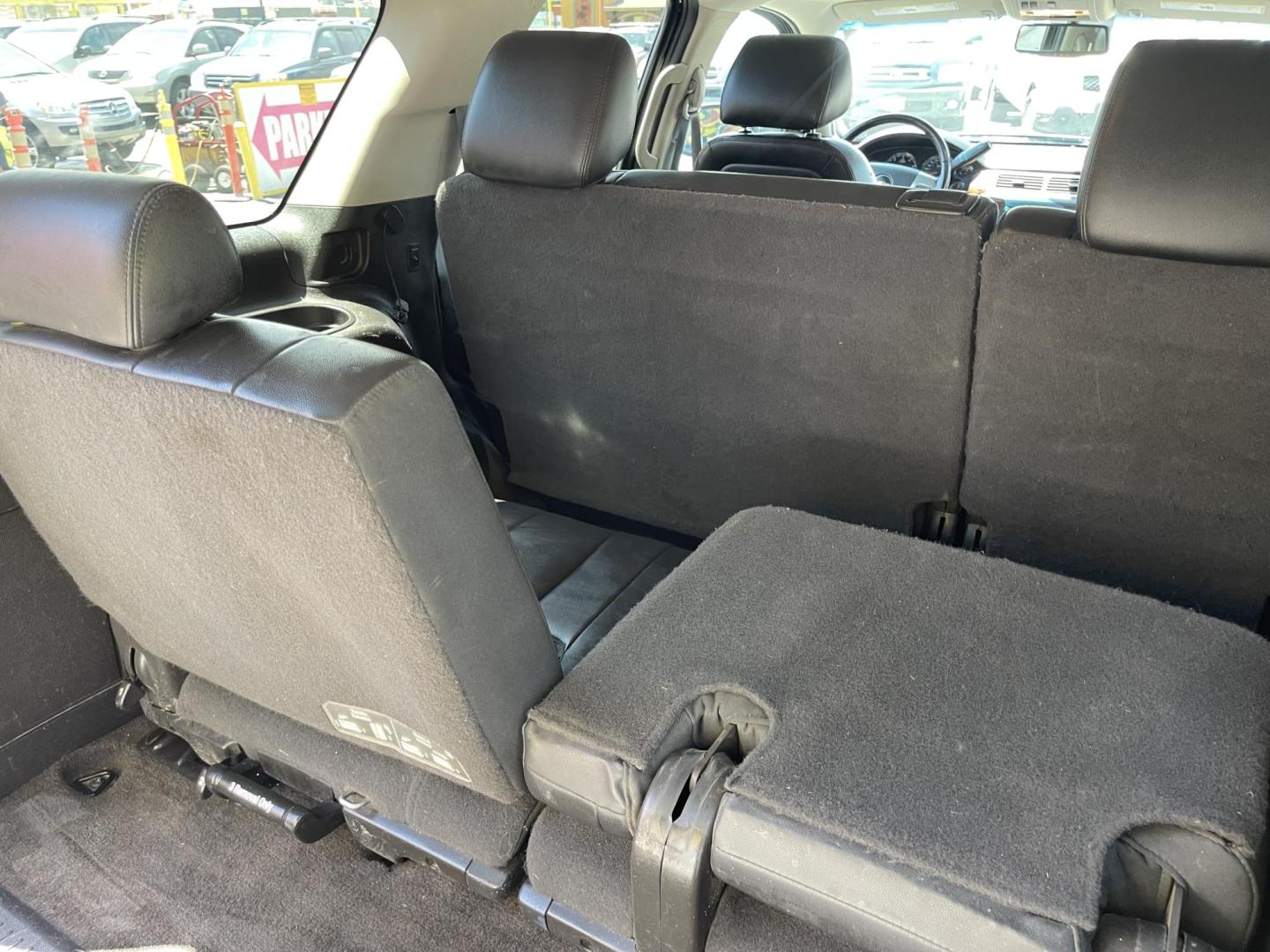 2014 Black /Black Chevrolet Tahoe LT 4WD (1GNSKBE08ER) with an 5.3L V8 OHV 16V FFV engine, 6-Speed Automatic transmission, located at 801 South State Street, Salt Lake City, UT, 84111, (801) 328-0098, 40.751953, -111.888206 - Clean title! Immaculate condition inside and out! Must see 3rd row SUV with 4x4 and leather interior! Approved for up to a 5 year warranty through Protective! Already passed Utah state emissions and been inspected by a mechanic and approved for up to a 5 year powertrain warranty by the warranty mech - Photo#25