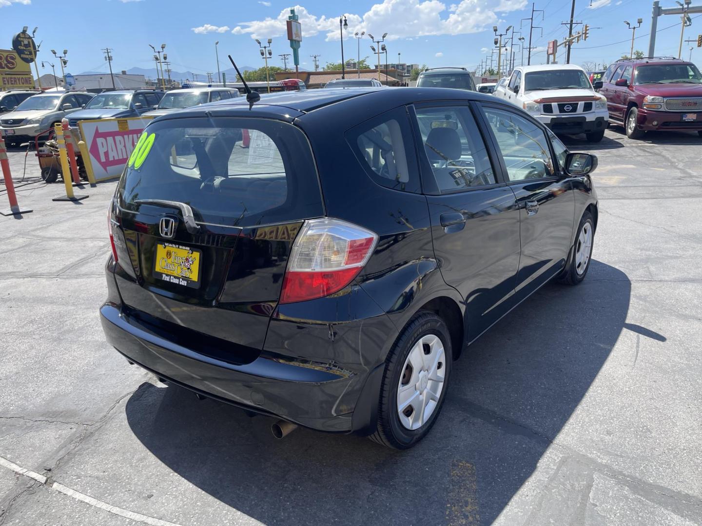 2012 Black /BLACK Honda Fit 5-Speed AT (JHMGE8H34CS) with an 1.5L L4 SOHC 16V engine, 5-Speed Automatic transmission, located at 801 South State Street, Salt Lake City, UT, 84111, (801) 328-0098, 40.751953, -111.888206 - Clean Title only 2 previous owners on the Carfax history report! Excellent gas mileage this 2012 Honda Fit gets up to 28 MPG city and 35 MPG highway!!! This is a must see for anyone looking for a nice affordable car!!! Features: Cloth Seats, ABS Brakes, AM/FM Stereo, Air Conditioning, Automatic Tra - Photo#5