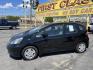 2012 Black /BLACK Honda Fit 5-Speed AT (JHMGE8H34CS) with an 1.5L L4 SOHC 16V engine, 5-Speed Automatic transmission, located at 801 South State Street, Salt Lake City, UT, 84111, (801) 328-0098, 40.751953, -111.888206 - Clean Title only 2 previous owners on the Carfax history report! Excellent gas mileage this 2012 Honda Fit gets up to 28 MPG city and 35 MPG highway!!! This is a must see for anyone looking for a nice affordable car!!! Features: Cloth Seats, ABS Brakes, AM/FM Stereo, Air Conditioning, Automatic Tra - Photo#9