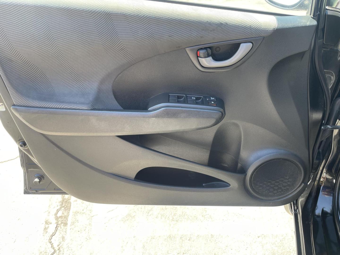 2012 Black /BLACK Honda Fit 5-Speed AT (JHMGE8H34CS) with an 1.5L L4 SOHC 16V engine, 5-Speed Automatic transmission, located at 801 South State Street, Salt Lake City, UT, 84111, (801) 328-0098, 40.751953, -111.888206 - Clean Title only 2 previous owners on the Carfax history report! Excellent gas mileage this 2012 Honda Fit gets up to 28 MPG city and 35 MPG highway!!! This is a must see for anyone looking for a nice affordable car!!! Features: Cloth Seats, ABS Brakes, AM/FM Stereo, Air Conditioning, Automatic Tra - Photo#15