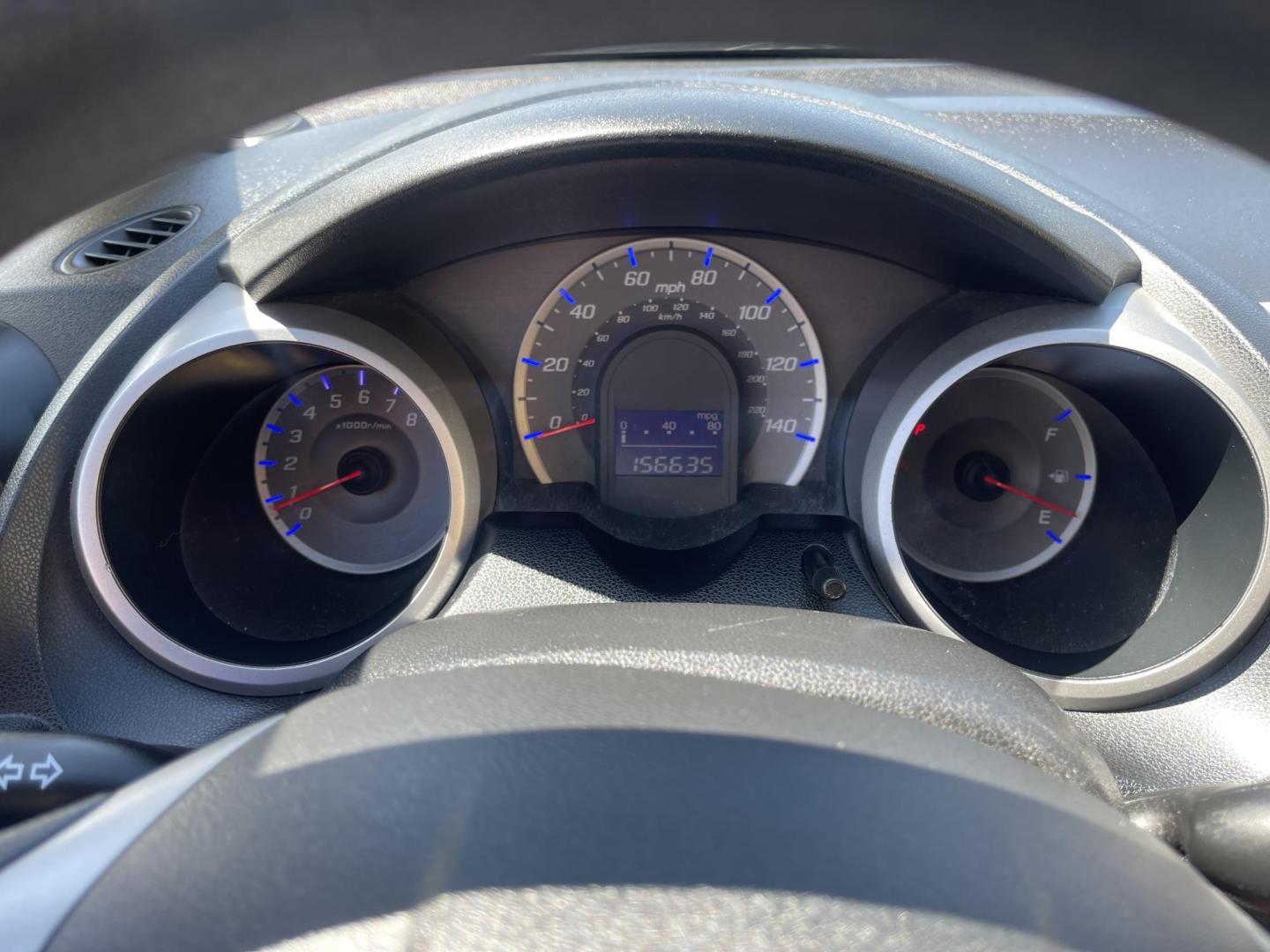 2012 Black /BLACK Honda Fit 5-Speed AT (JHMGE8H34CS) with an 1.5L L4 SOHC 16V engine, 5-Speed Automatic transmission, located at 801 South State Street, Salt Lake City, UT, 84111, (801) 328-0098, 40.751953, -111.888206 - Clean Title only 2 previous owners on the Carfax history report! Excellent gas mileage this 2012 Honda Fit gets up to 28 MPG city and 35 MPG highway!!! This is a must see for anyone looking for a nice affordable car!!! Features: Cloth Seats, ABS Brakes, AM/FM Stereo, Air Conditioning, Automatic Tra - Photo#18