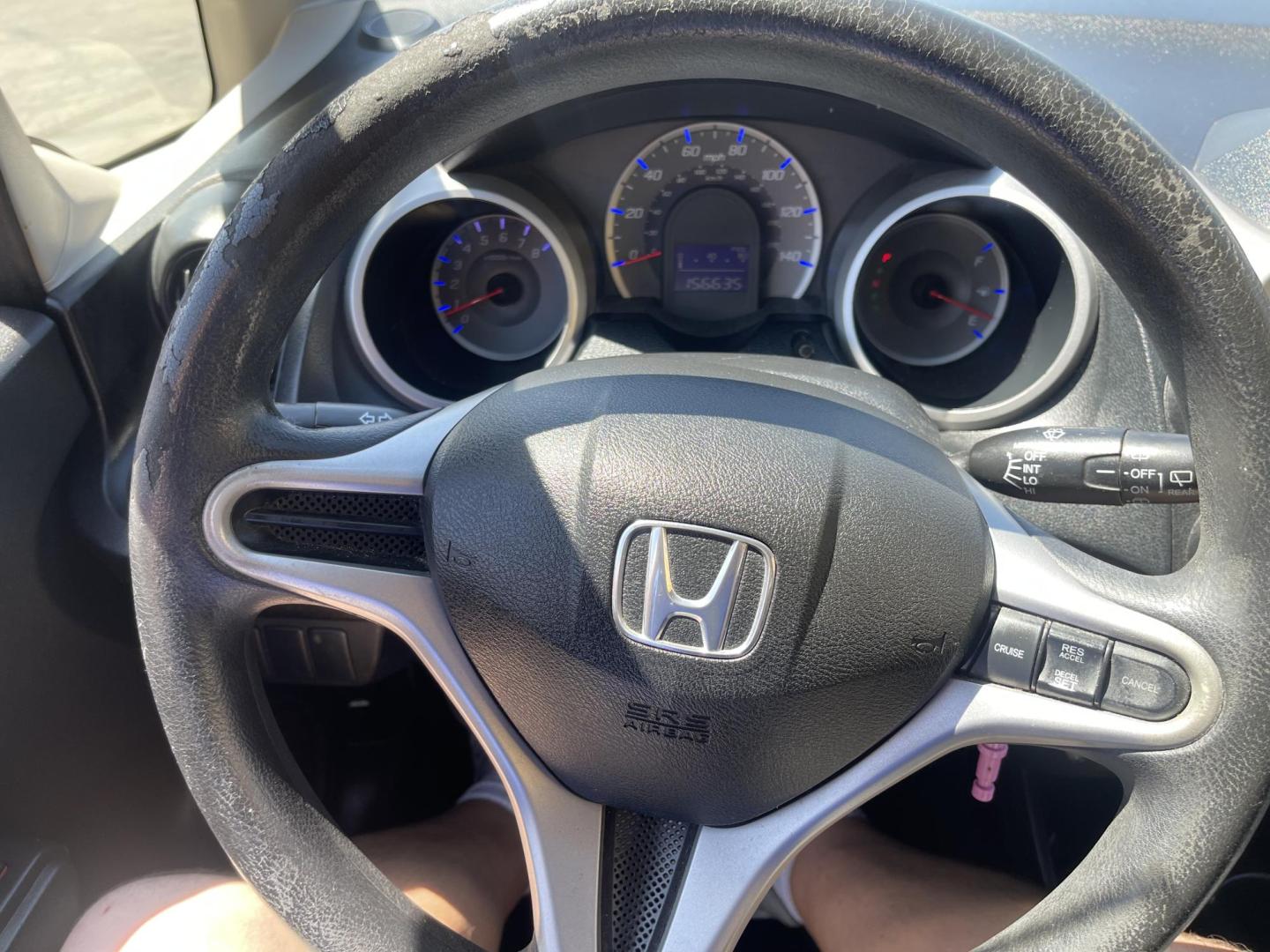 2012 Black /BLACK Honda Fit 5-Speed AT (JHMGE8H34CS) with an 1.5L L4 SOHC 16V engine, 5-Speed Automatic transmission, located at 801 South State Street, Salt Lake City, UT, 84111, (801) 328-0098, 40.751953, -111.888206 - Clean Title only 2 previous owners on the Carfax history report! Excellent gas mileage this 2012 Honda Fit gets up to 28 MPG city and 35 MPG highway!!! This is a must see for anyone looking for a nice affordable car!!! Features: Cloth Seats, ABS Brakes, AM/FM Stereo, Air Conditioning, Automatic Tra - Photo#19