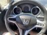 2012 Black /BLACK Honda Fit 5-Speed AT (JHMGE8H34CS) with an 1.5L L4 SOHC 16V engine, 5-Speed Automatic transmission, located at 801 South State Street, Salt Lake City, UT, 84111, (801) 328-0098, 40.751953, -111.888206 - Clean Title only 2 previous owners on the Carfax history report! Excellent gas mileage this 2012 Honda Fit gets up to 28 MPG city and 35 MPG highway!!! This is a must see for anyone looking for a nice affordable car!!! Features: Cloth Seats, ABS Brakes, AM/FM Stereo, Air Conditioning, Automatic Tra - Photo#19
