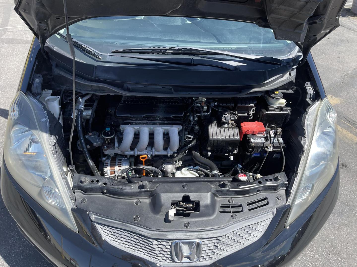2012 Black /BLACK Honda Fit 5-Speed AT (JHMGE8H34CS) with an 1.5L L4 SOHC 16V engine, 5-Speed Automatic transmission, located at 801 South State Street, Salt Lake City, UT, 84111, (801) 328-0098, 40.751953, -111.888206 - Clean Title only 2 previous owners on the Carfax history report! Excellent gas mileage this 2012 Honda Fit gets up to 28 MPG city and 35 MPG highway!!! This is a must see for anyone looking for a nice affordable car!!! Features: Cloth Seats, ABS Brakes, AM/FM Stereo, Air Conditioning, Automatic Tra - Photo#21
