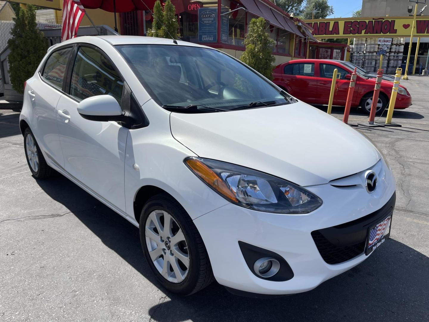 2013 Super White /BLACK Mazda MAZDA2 Touring (JM1DE1LZ7D0) with an 1.5L L4 DOHC 16V engine, Automatic transmission, located at 801 South State Street, Salt Lake City, UT, 84111, (801) 328-0098, 40.751953, -111.888206 - Clean Title!!! Good condition for the year, make and miles! Great gas mileage averaging 29 mpg in the city and 35 mpg on the highway! Approved for up to a 5 year warranty through Protective warranty company! Must see for anyone looking for clean reliable transportation and great gas mileage that wi - Photo#3