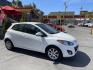 2013 Super White /BLACK Mazda MAZDA2 Touring (JM1DE1LZ7D0) with an 1.5L L4 DOHC 16V engine, Automatic transmission, located at 801 South State Street, Salt Lake City, UT, 84111, (801) 328-0098, 40.751953, -111.888206 - Clean Title!!! Good condition for the year, make and miles! Great gas mileage averaging 29 mpg in the city and 35 mpg on the highway! Approved for up to a 5 year warranty through Protective warranty company! Must see for anyone looking for clean reliable transportation and great gas mileage that wi - Photo#4
