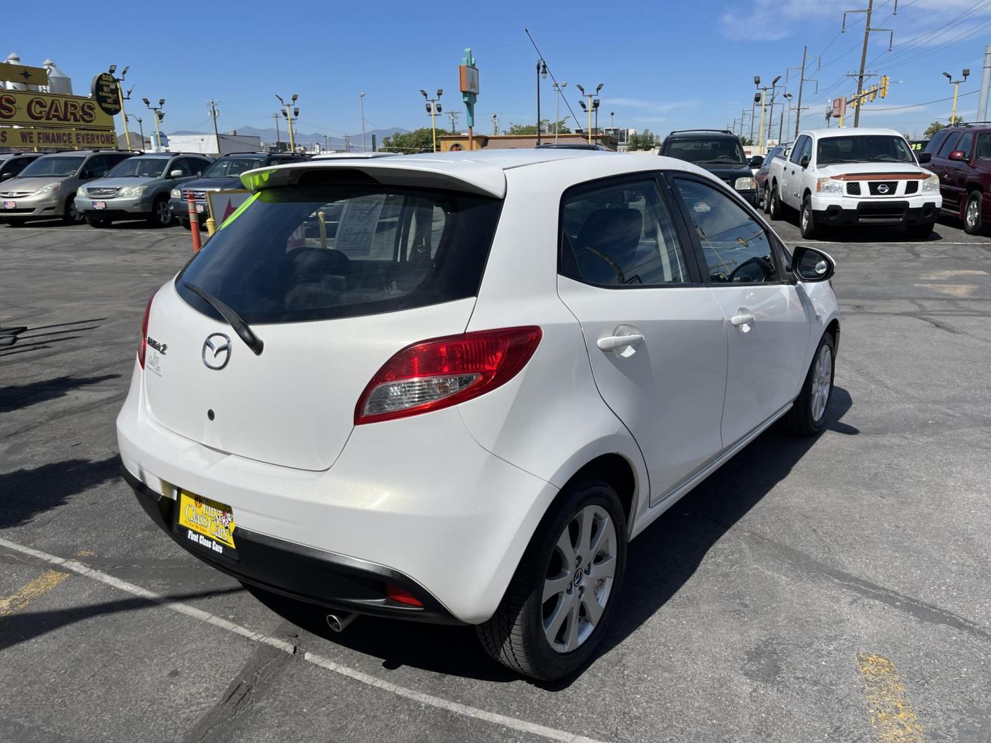 2013 Super White /BLACK Mazda MAZDA2 Touring (JM1DE1LZ7D0) with an 1.5L L4 DOHC 16V engine, Automatic transmission, located at 801 South State Street, Salt Lake City, UT, 84111, (801) 328-0098, 40.751953, -111.888206 - Clean Title!!! Good condition for the year, make and miles! Great gas mileage averaging 29 mpg in the city and 35 mpg on the highway! Approved for up to a 5 year warranty through Protective warranty company! Must see for anyone looking for clean reliable transportation and great gas mileage that wi - Photo#6