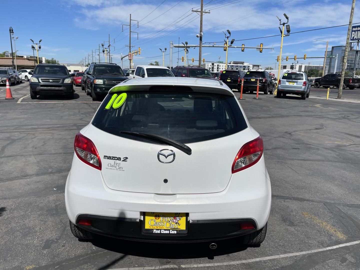 2013 Super White /BLACK Mazda MAZDA2 Touring (JM1DE1LZ7D0) with an 1.5L L4 DOHC 16V engine, Automatic transmission, located at 801 South State Street, Salt Lake City, UT, 84111, (801) 328-0098, 40.751953, -111.888206 - Clean Title!!! Good condition for the year, make and miles! Great gas mileage averaging 29 mpg in the city and 35 mpg on the highway! Approved for up to a 5 year warranty through Protective warranty company! Must see for anyone looking for clean reliable transportation and great gas mileage that wi - Photo#7