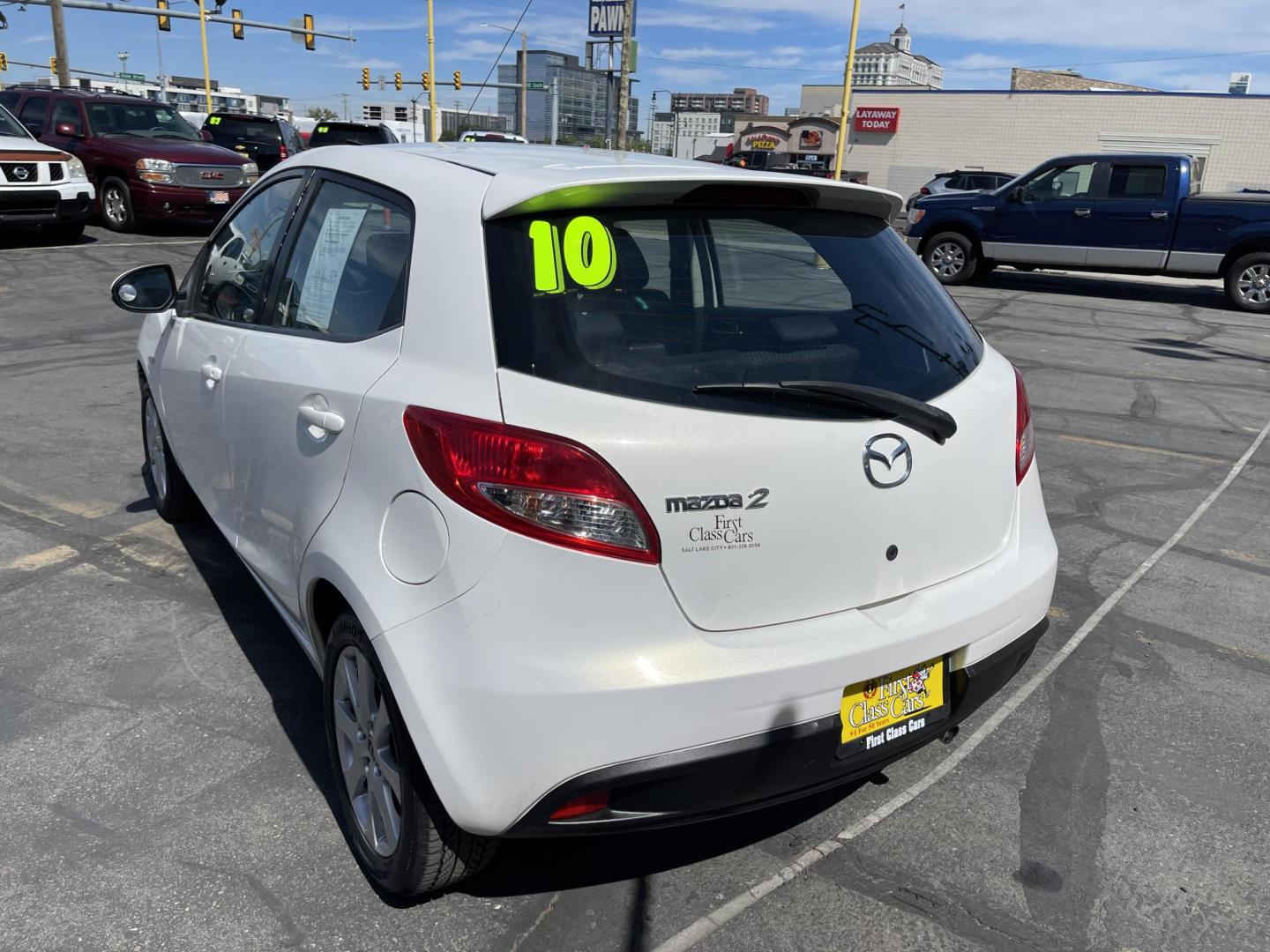 2013 Super White /BLACK Mazda MAZDA2 Touring (JM1DE1LZ7D0) with an 1.5L L4 DOHC 16V engine, Automatic transmission, located at 801 South State Street, Salt Lake City, UT, 84111, (801) 328-0098, 40.751953, -111.888206 - Clean Title!!! Good condition for the year, make and miles! Great gas mileage averaging 29 mpg in the city and 35 mpg on the highway! Approved for up to a 5 year warranty through Protective warranty company! Must see for anyone looking for clean reliable transportation and great gas mileage that wi - Photo#8