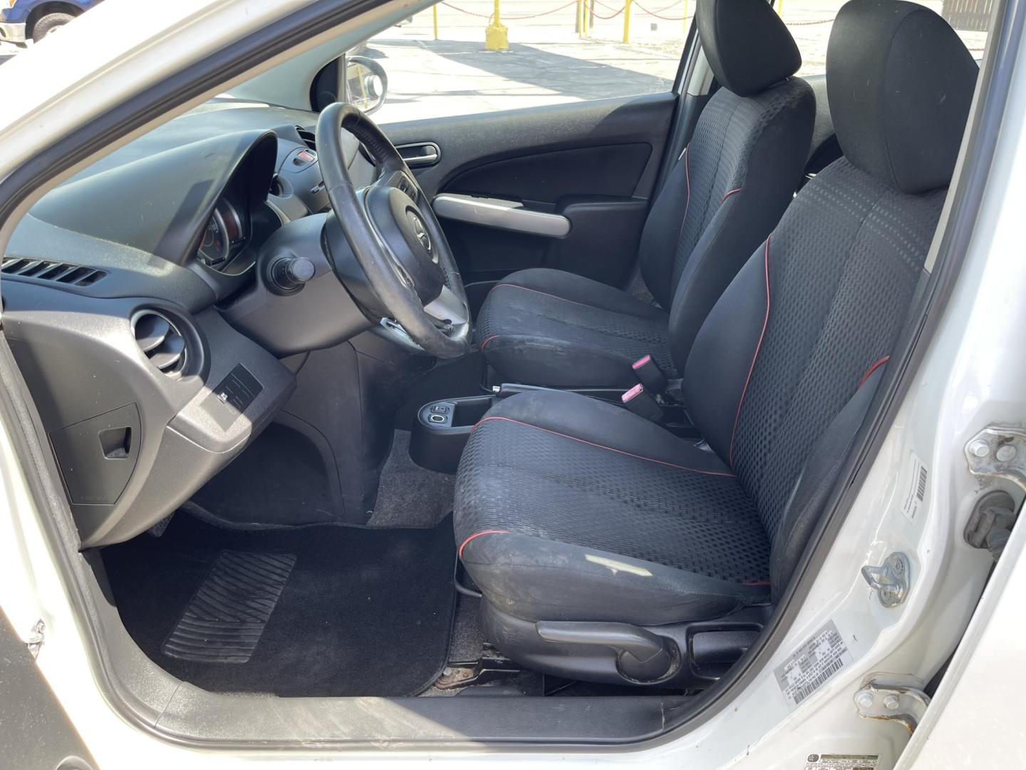 2013 Super White /BLACK Mazda MAZDA2 Touring (JM1DE1LZ7D0) with an 1.5L L4 DOHC 16V engine, Automatic transmission, located at 801 South State Street, Salt Lake City, UT, 84111, (801) 328-0098, 40.751953, -111.888206 - Clean Title!!! Good condition for the year, make and miles! Great gas mileage averaging 29 mpg in the city and 35 mpg on the highway! Approved for up to a 5 year warranty through Protective warranty company! Must see for anyone looking for clean reliable transportation and great gas mileage that wi - Photo#12
