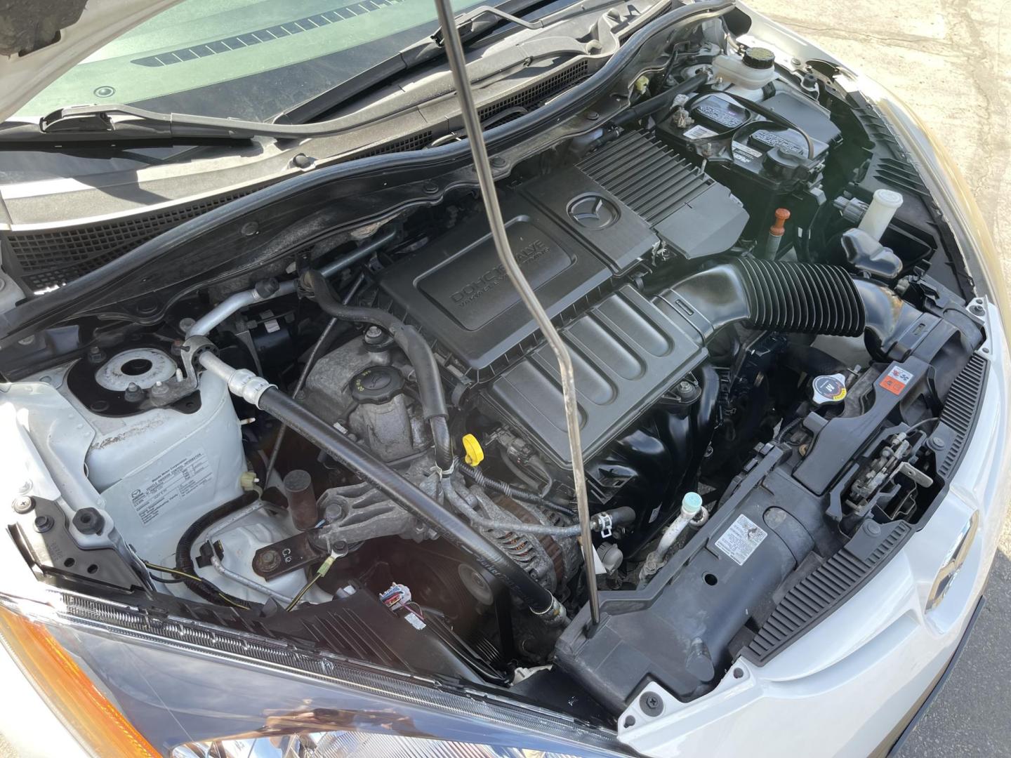 2013 Super White /BLACK Mazda MAZDA2 Touring (JM1DE1LZ7D0) with an 1.5L L4 DOHC 16V engine, Automatic transmission, located at 801 South State Street, Salt Lake City, UT, 84111, (801) 328-0098, 40.751953, -111.888206 - Clean Title!!! Good condition for the year, make and miles! Great gas mileage averaging 29 mpg in the city and 35 mpg on the highway! Approved for up to a 5 year warranty through Protective warranty company! Must see for anyone looking for clean reliable transportation and great gas mileage that wi - Photo#23