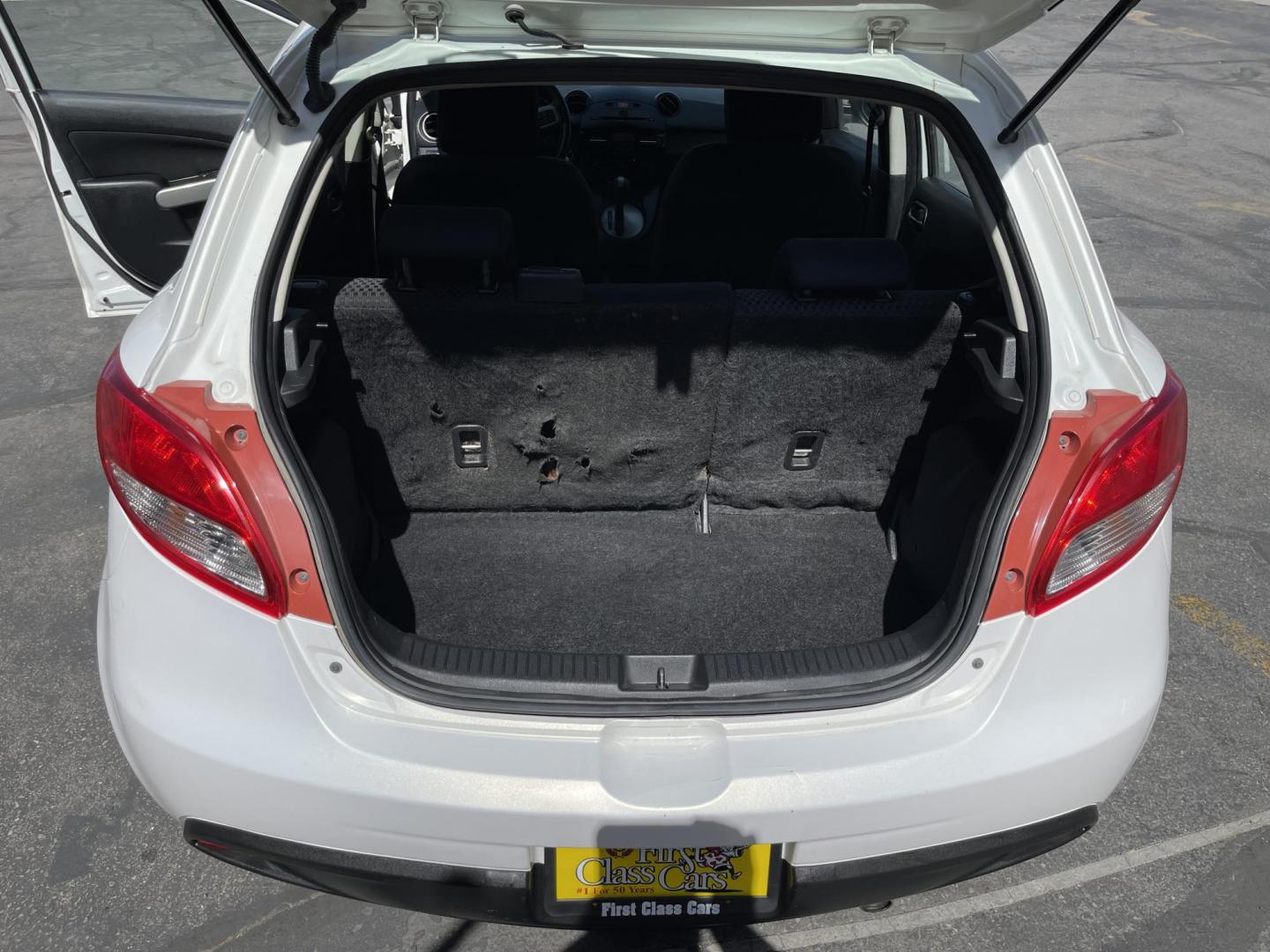 2013 Super White /BLACK Mazda MAZDA2 Touring (JM1DE1LZ7D0) with an 1.5L L4 DOHC 16V engine, Automatic transmission, located at 801 South State Street, Salt Lake City, UT, 84111, (801) 328-0098, 40.751953, -111.888206 - Clean Title!!! Good condition for the year, make and miles! Great gas mileage averaging 29 mpg in the city and 35 mpg on the highway! Approved for up to a 5 year warranty through Protective warranty company! Must see for anyone looking for clean reliable transportation and great gas mileage that wi - Photo#26