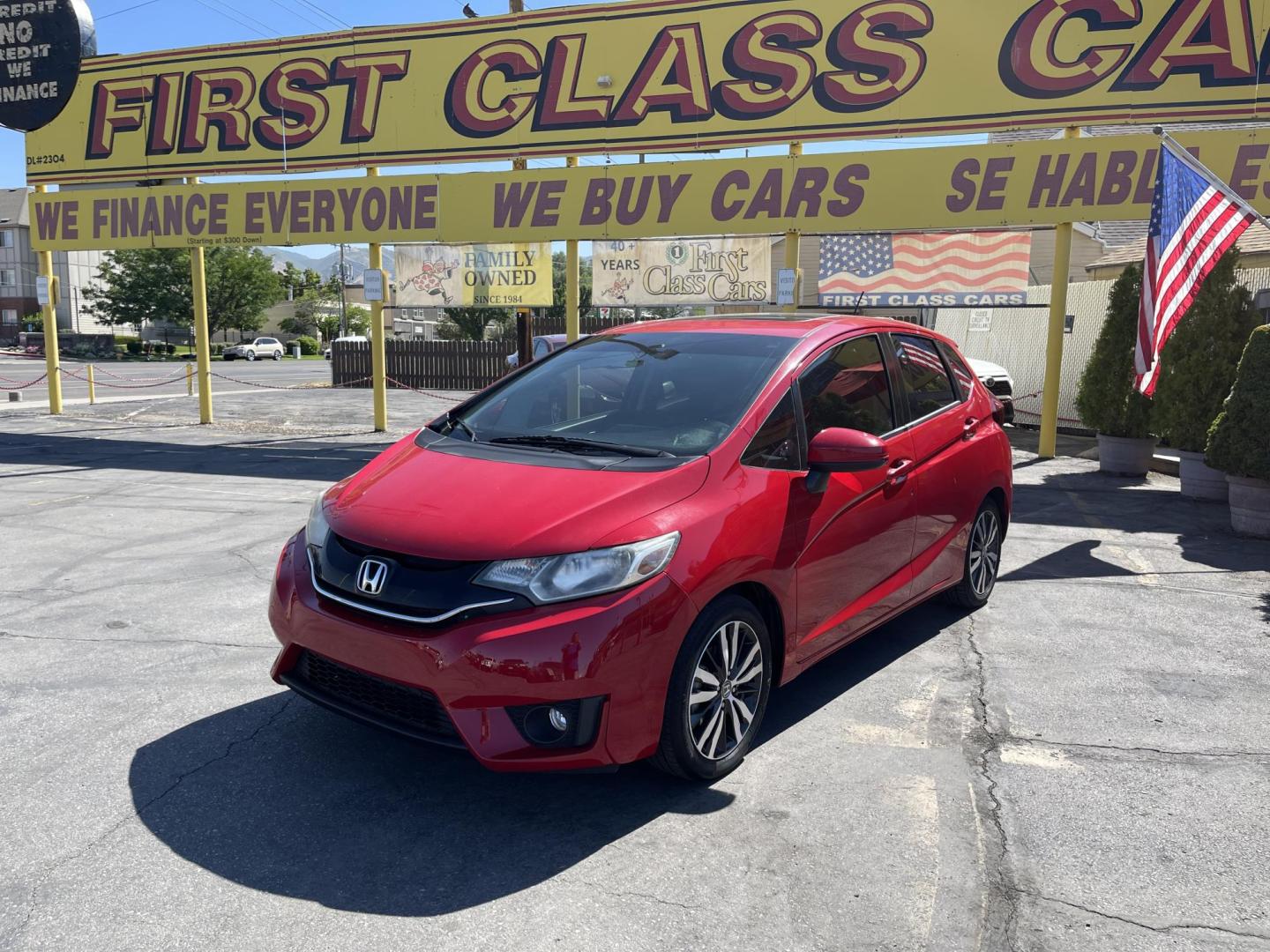 2016 Flame Red /BLACK Honda Fit EX CVT (JHMGK5H71GX) with an 1.5L L4 SOHC 16V engine, CVT transmission, located at 801 South State Street, Salt Lake City, UT, 84111, (801) 328-0098, 40.751953, -111.888206 - Clean title!!! This one is a must see in excellent condition for the year, make and miles! Has been cared for and serviced regularly as stated on the Carfax. Immaculate inside and out come see for yourself today! Great gas mileage this averages 33 MPG city / 41 MPG highway / 36 combined MPG impressi - Photo#2