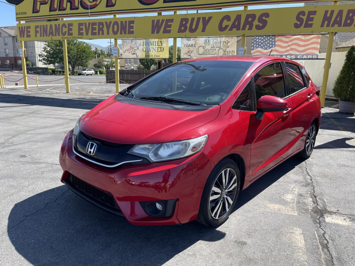 2016 Flame Red /BLACK Honda Fit EX CVT (JHMGK5H71GX) with an 1.5L L4 SOHC 16V engine, CVT transmission, located at 801 South State Street, Salt Lake City, UT, 84111, (801) 328-0098, 40.751953, -111.888206 - Clean title!!! This one is a must see in excellent condition for the year, make and miles! Has been cared for and serviced regularly as stated on the Carfax. Immaculate inside and out come see for yourself today! Great gas mileage this averages 33 MPG city / 41 MPG highway / 36 combined MPG impressi - Photo#1