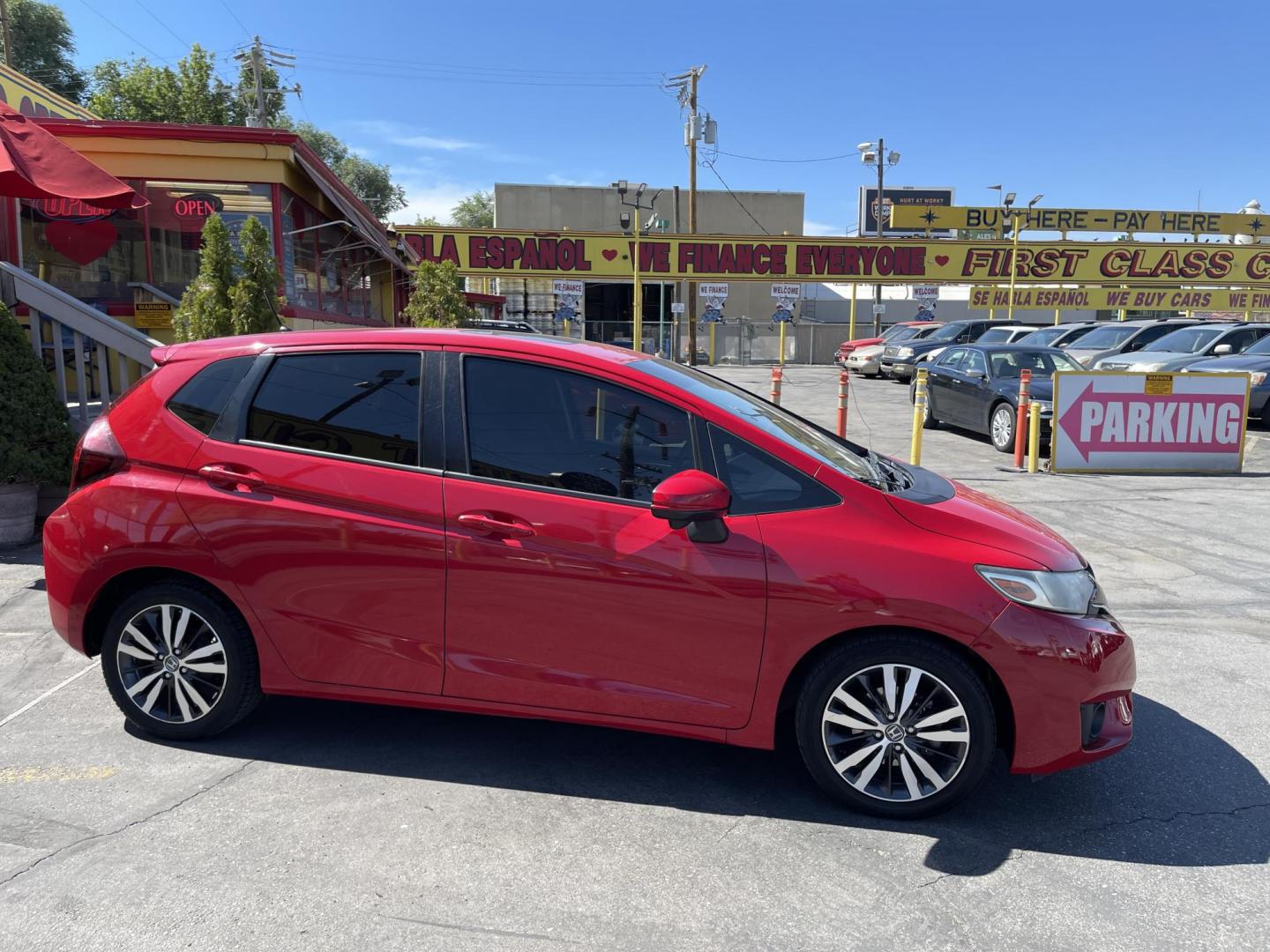 2016 Flame Red /BLACK Honda Fit EX CVT (JHMGK5H71GX) with an 1.5L L4 SOHC 16V engine, CVT transmission, located at 801 South State Street, Salt Lake City, UT, 84111, (801) 328-0098, 40.751953, -111.888206 - Clean title!!! This one is a must see in excellent condition for the year, make and miles! Has been cared for and serviced regularly as stated on the Carfax. Immaculate inside and out come see for yourself today! Great gas mileage this averages 33 MPG city / 41 MPG highway / 36 combined MPG impressi - Photo#5